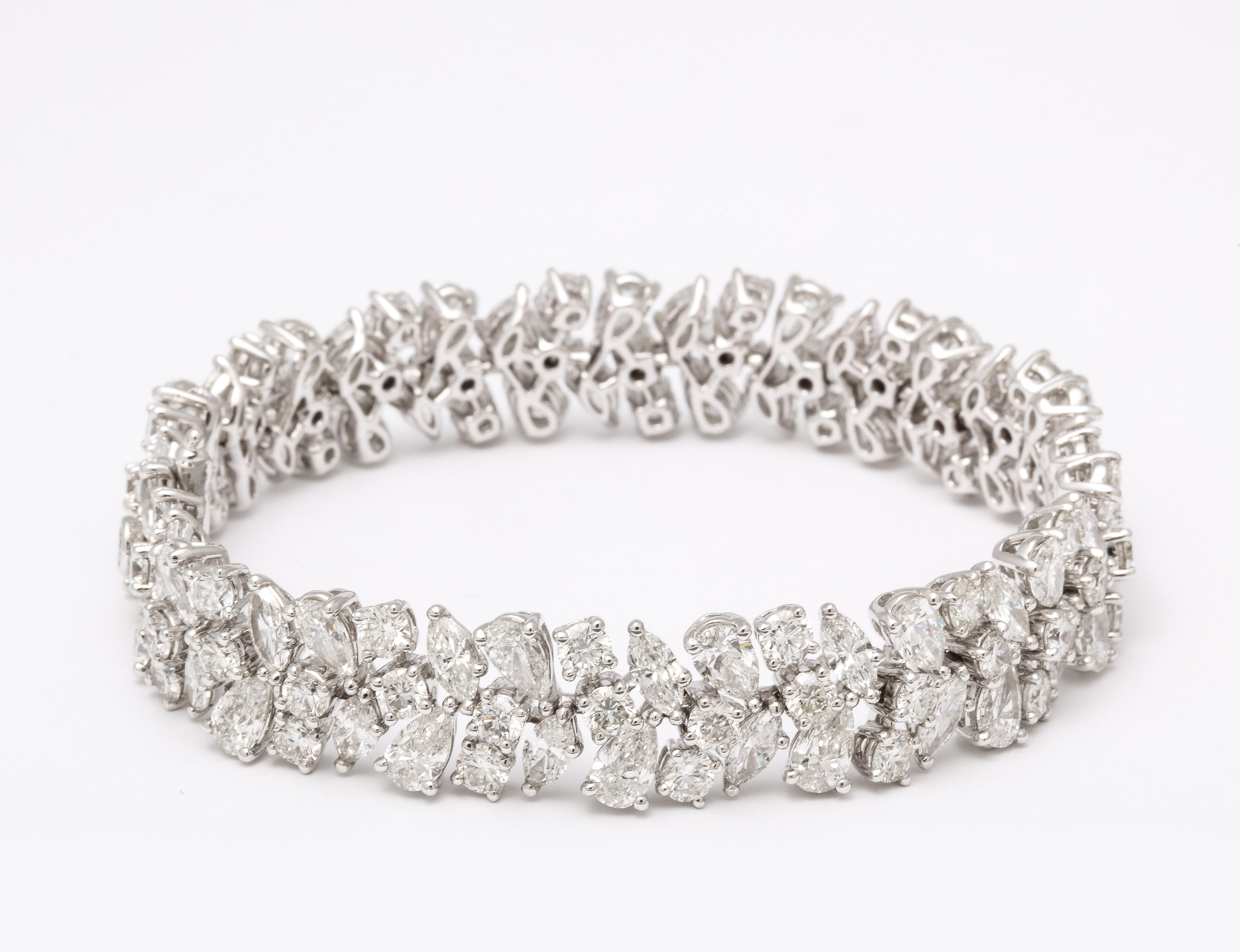 
The perfect bracelet, designed to compliment pieces in your existing collection. 

25.17 carats of white pear, round and marquise cut diamonds set in 18k white gold. 

Approximately 7.10 inches long. Just under half an inch wide. 

A timeless