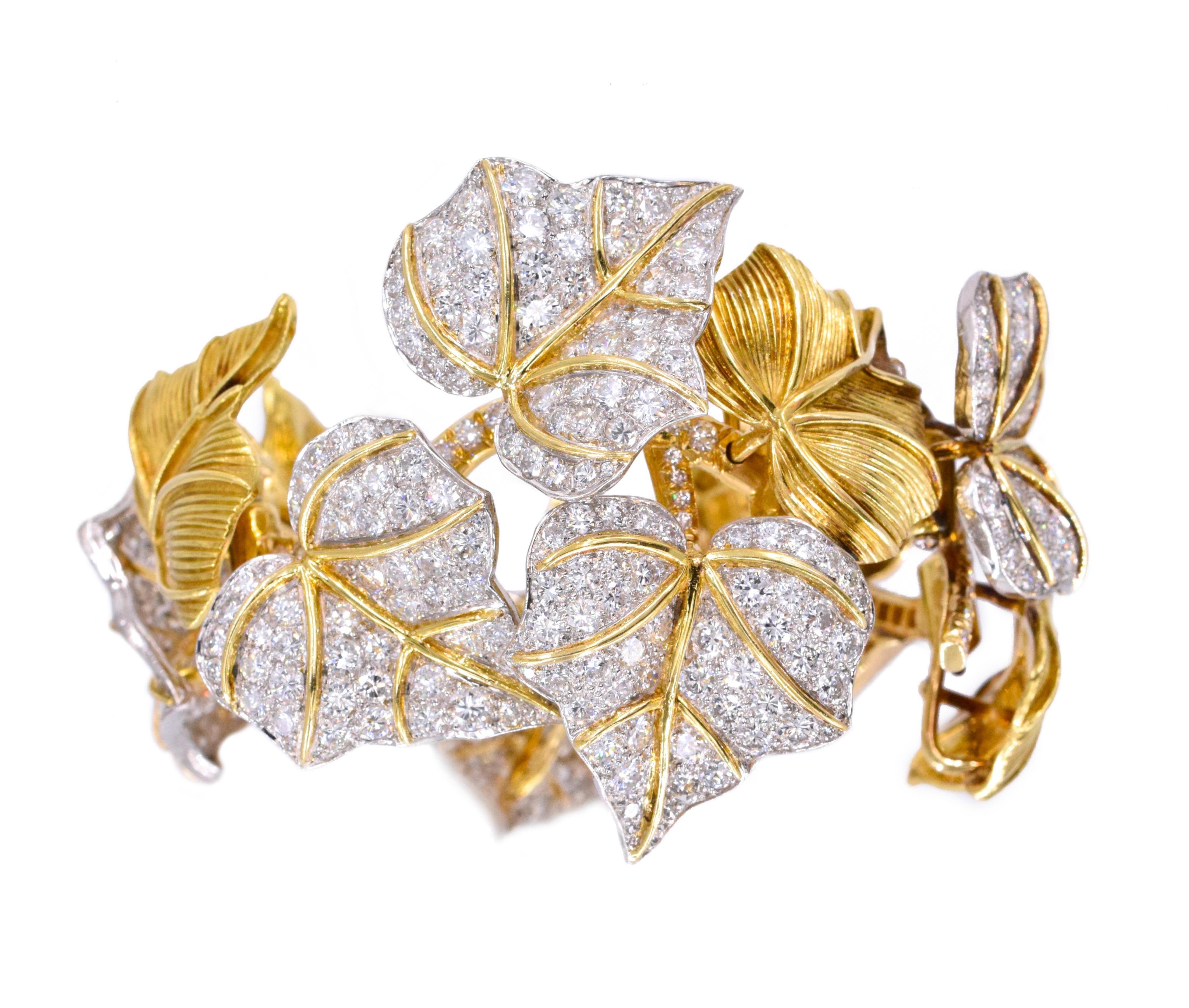 Gold and diamond bracelet
 Designed as a branch of ivy leaves of textured gold and set with brilliant-cut diamonds,
Diamonds estimated to weigh a total of approximately 20 carats, diamonds are near colorless & VS clarity
Gold weight is approximately