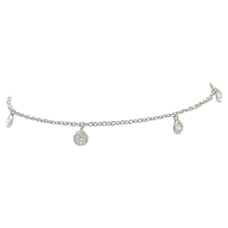 
This delicate bracelet is crafted from 18K white gold, known for its high quality and enduring finish. It features a total of 0.24 carats of diamonds, which are strategically placed along the chain, offering a subtle yet elegant sparkle. The design
