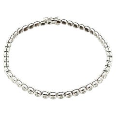 Diamond bracelet in 18K white gold.