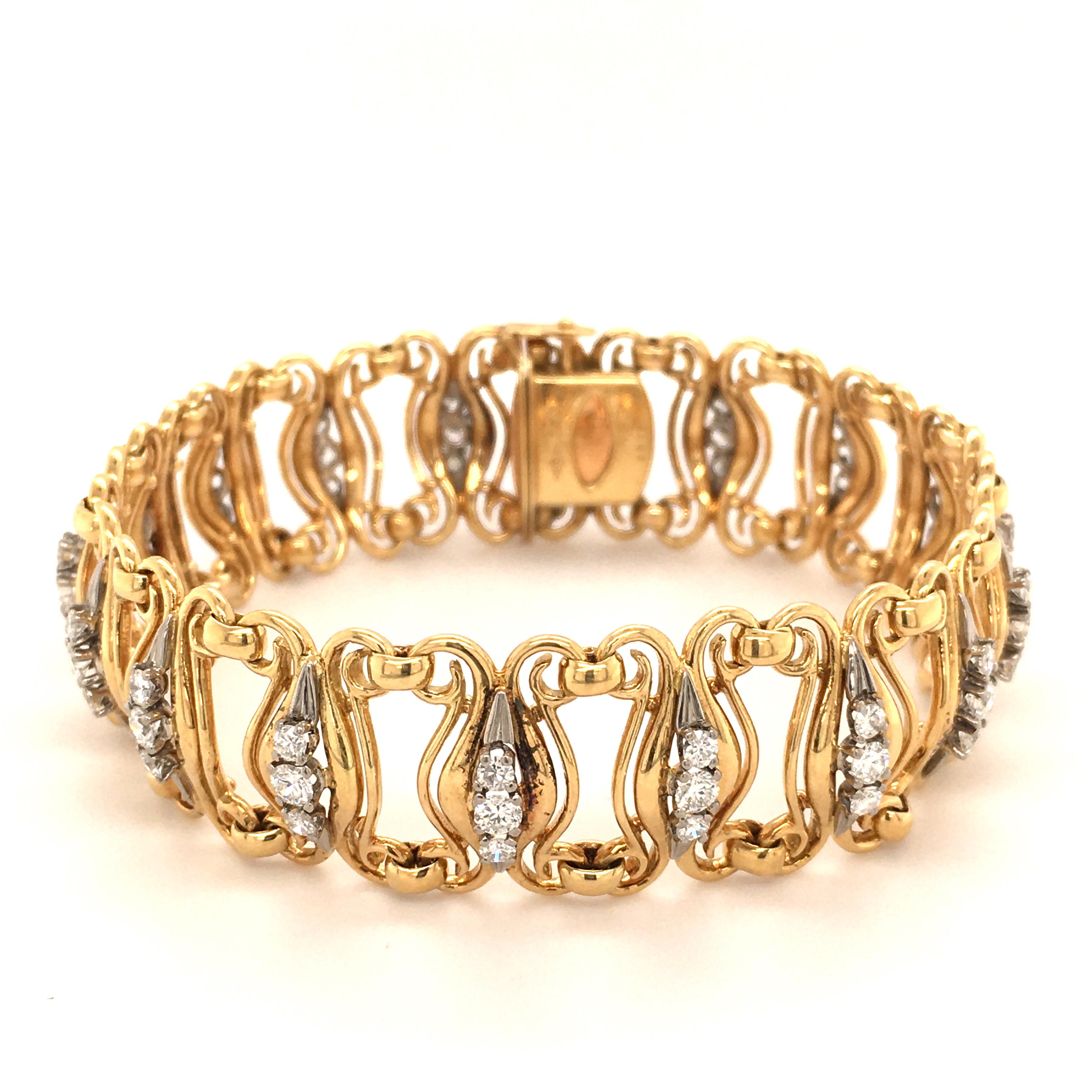 Link Bracelet in Yellow and White Gold 750 
The curved and moving Links, set with 54 Diamonds totalling 2.50 ct (Quality: G/H-vs), ensure that it fits perfectly and falls softly.
You can secure the clasp with a safety hook.

Engraving: