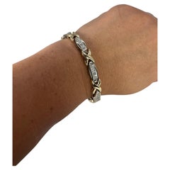 Bracciale con diamanti Bracciale grande in oro giallo 14 carati con incastonatura invisibile