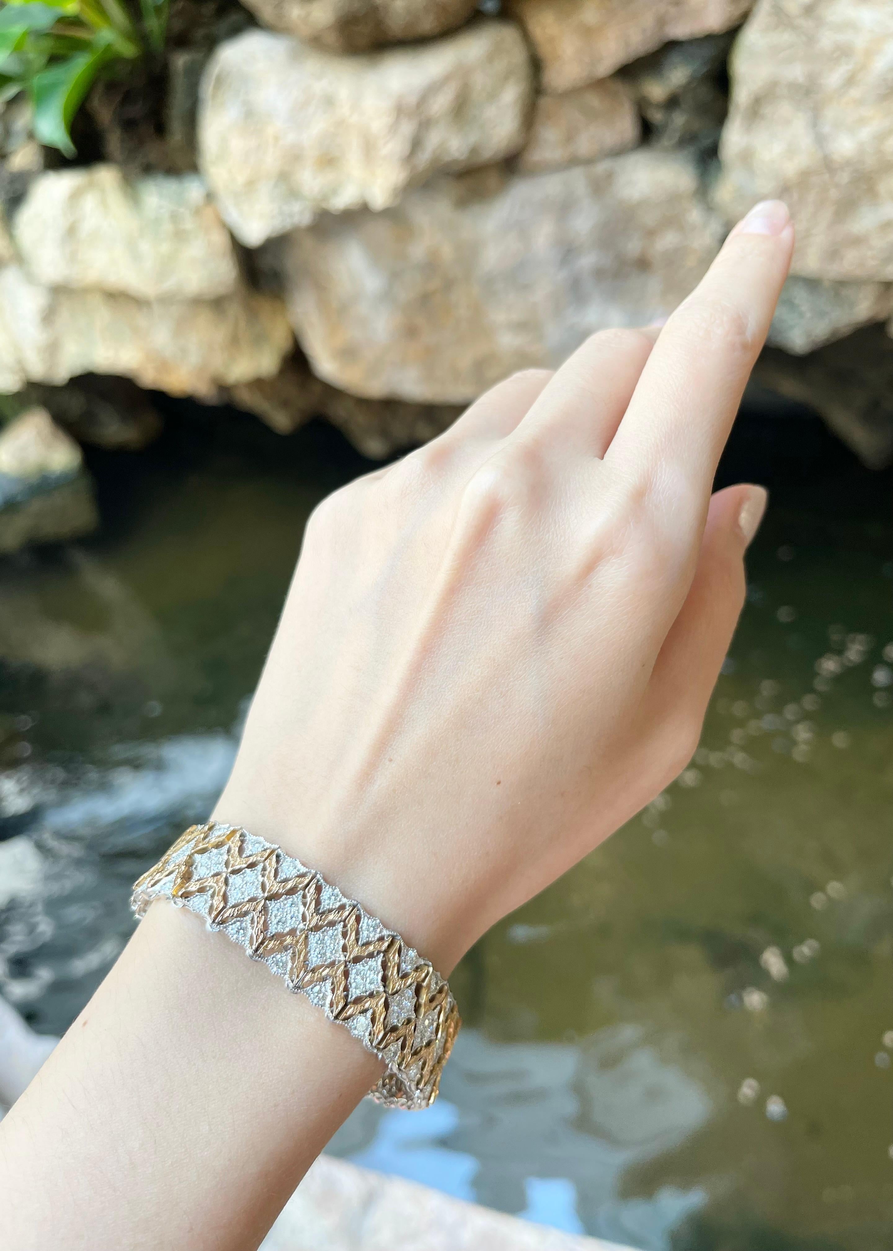 Diamond 6.09 carats Bracelet set in 18K Rose/White Gold Settings

Width: 1.7 cm 
Length: 18.0 cm
Total Weight: 49.14 grams

