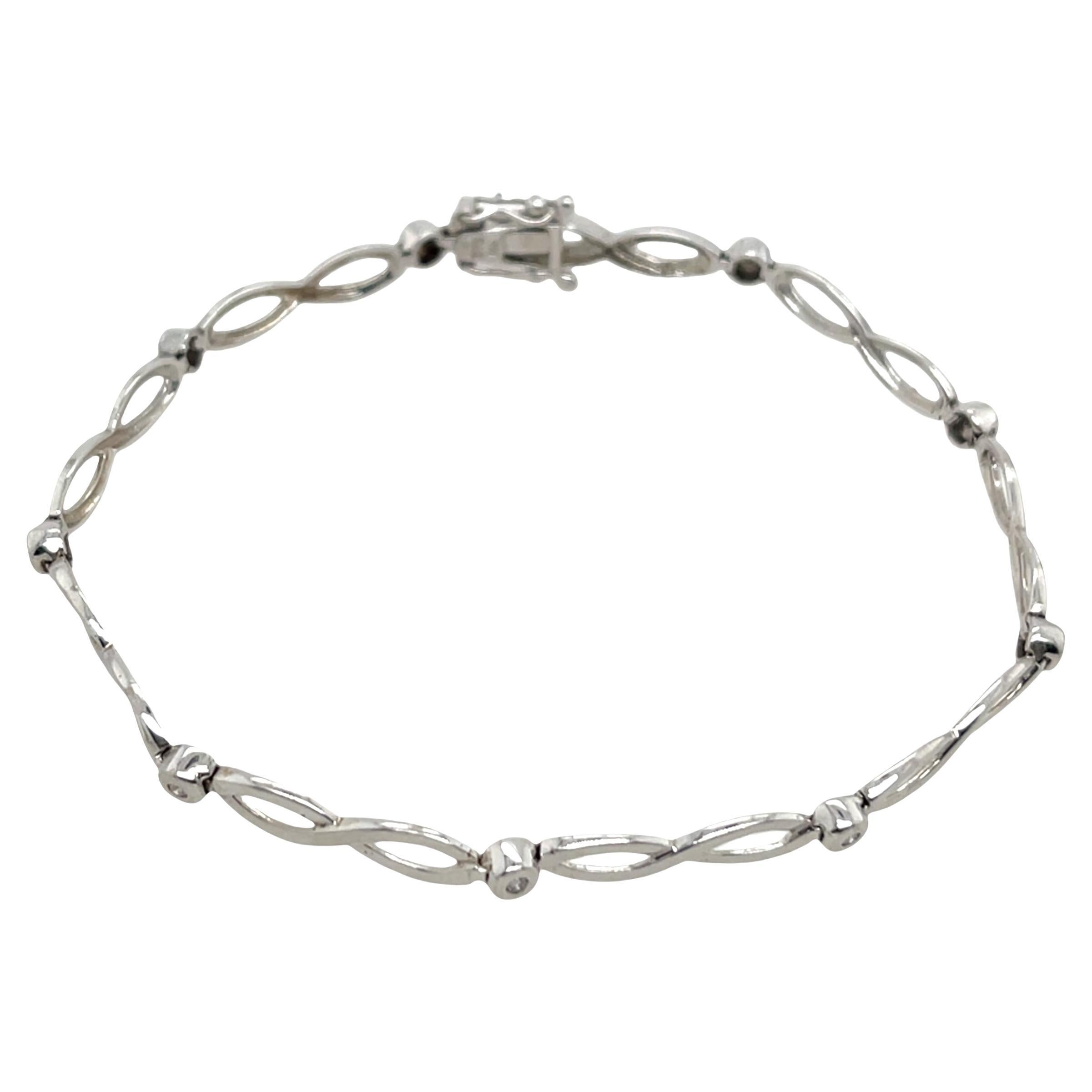 Diamond Bracelet Set in 9ct White Gold with 9 Round Diamonds