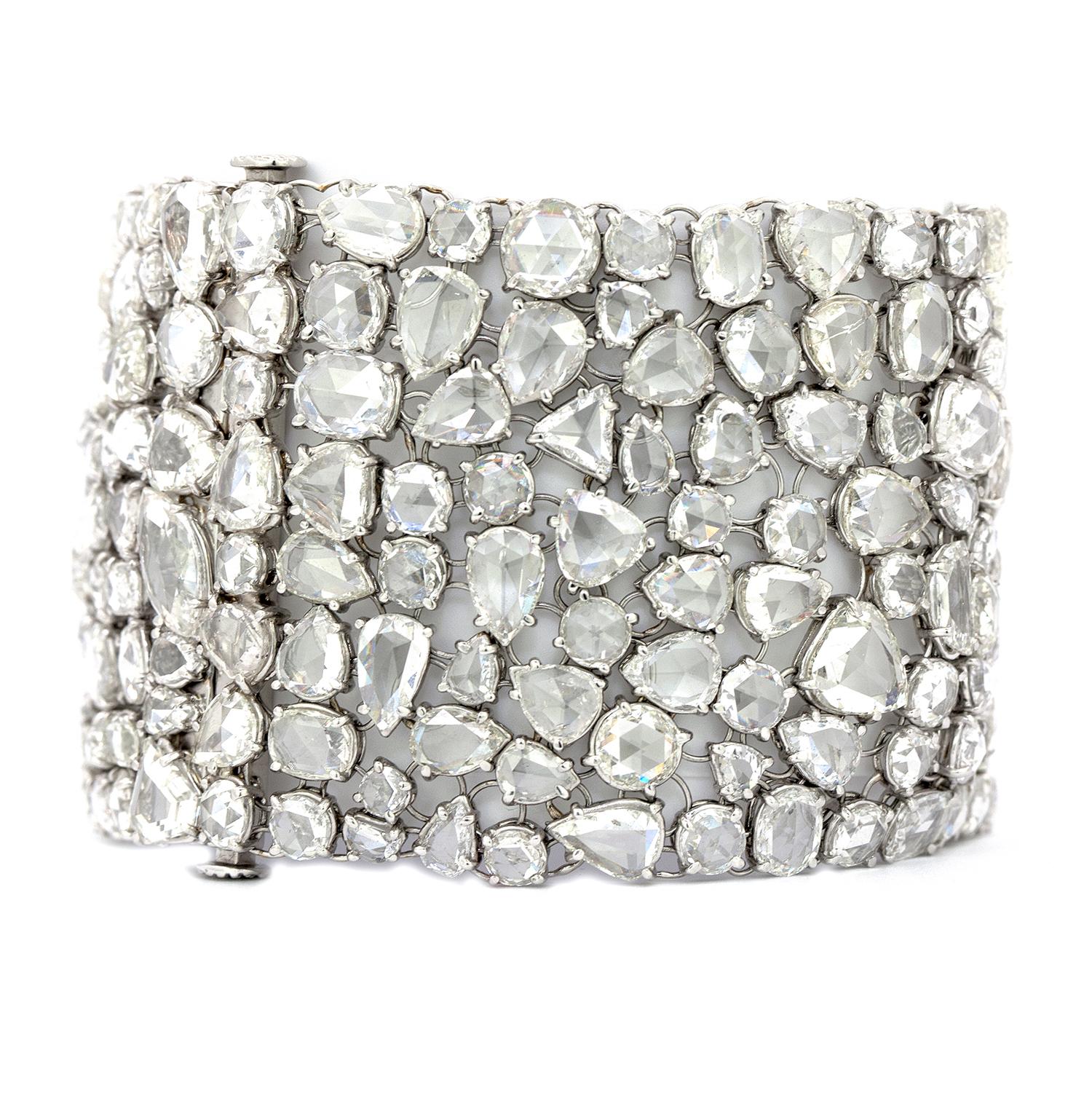 This truly unique, vintage diamond bracelet was expertly crafted in platinum for these 263 mixed shaped rose cut diamonds that weighs 100.37cts in total. The diamonds are graded as H VS/SI1.  Each diamond is individually set in a handmade platinum