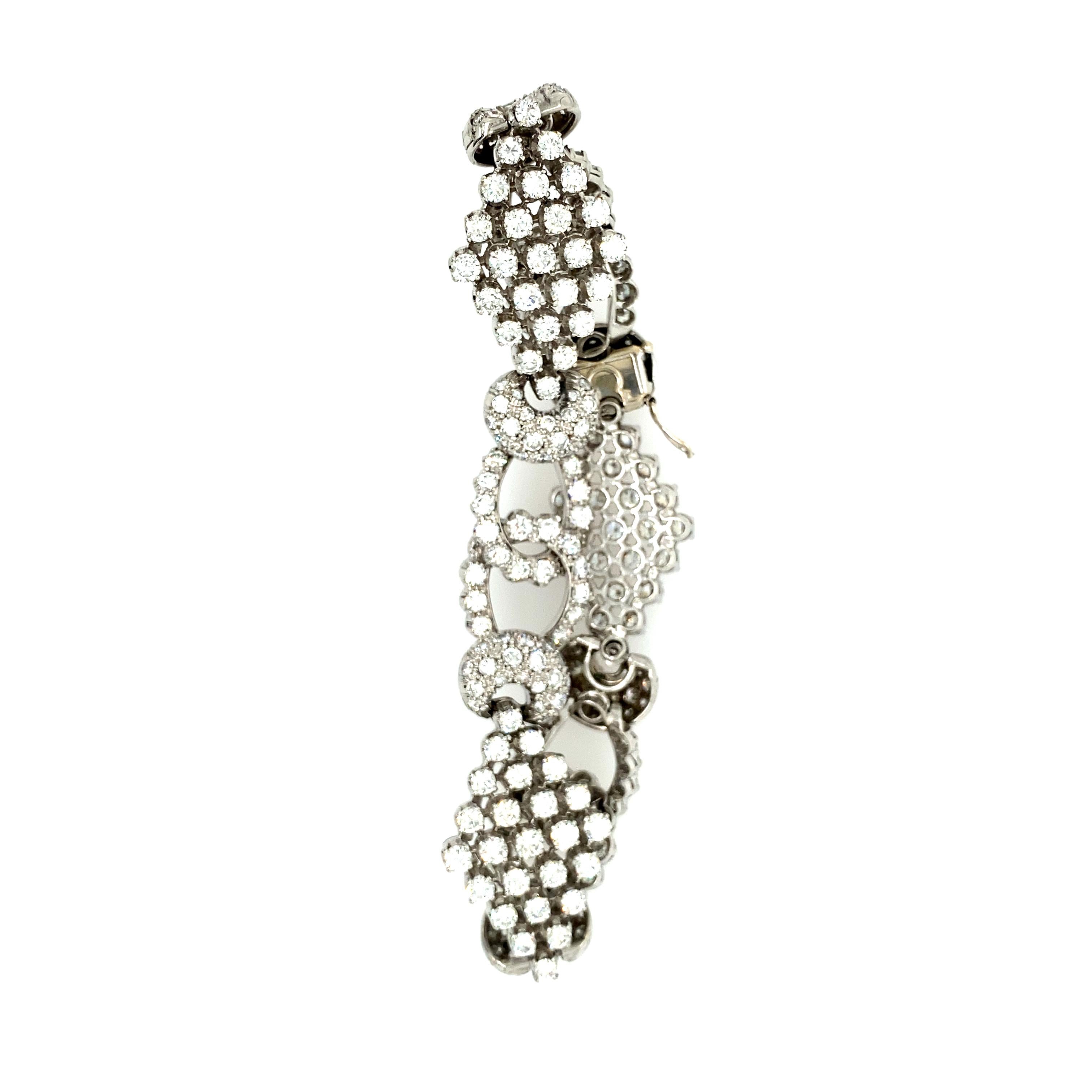 Fabulous Estate Diamond Bracelet with approximately 12.00cts of G-H VS round brilliant cut diamonds. The bracelet tests positive for 18k white gold, is 7.25'' long and circa. 1950-1960.