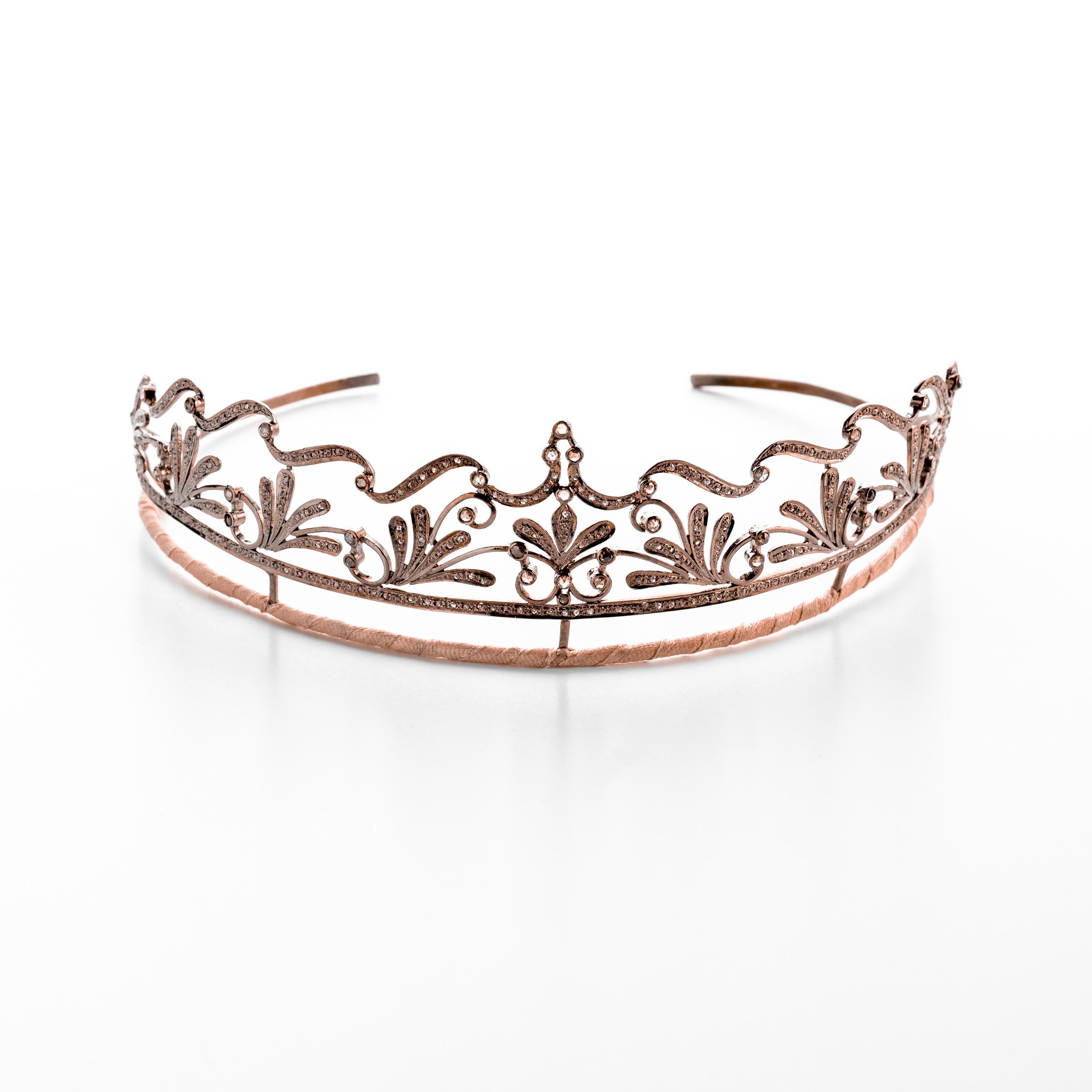 I commissioned this tiara from a jeweler overseas whose work I have long admired. It has been painstakingly crafted from silver and a multitude of glittering rose-cut diamonds that total just over 8 carats. You won't mistake this tiara for a piece