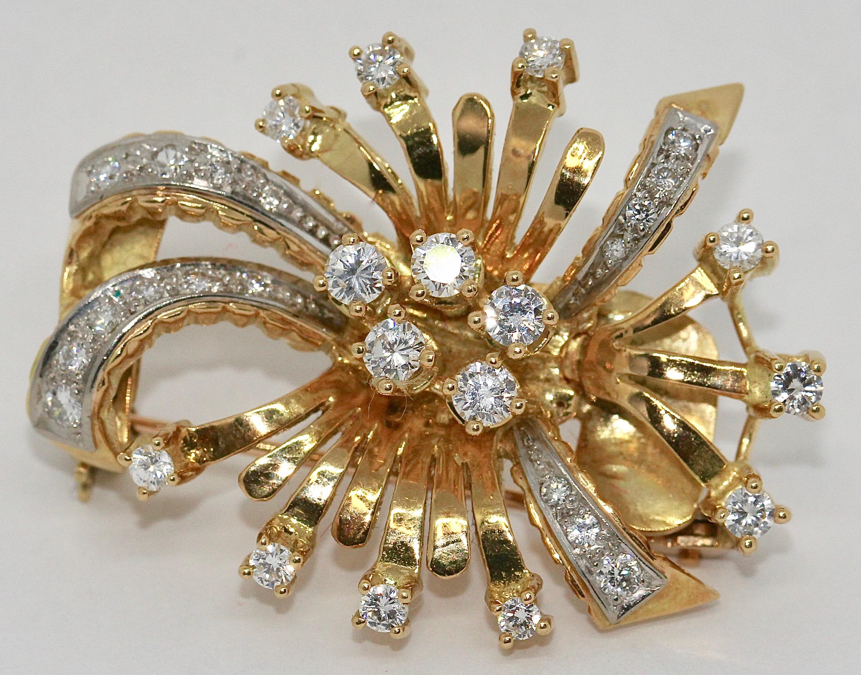 Diamond Brooch, 18 Karat Gold, in floral design.
Brooch can also be worn as a pendant.

The diamonds are of very good quality, color and purity.