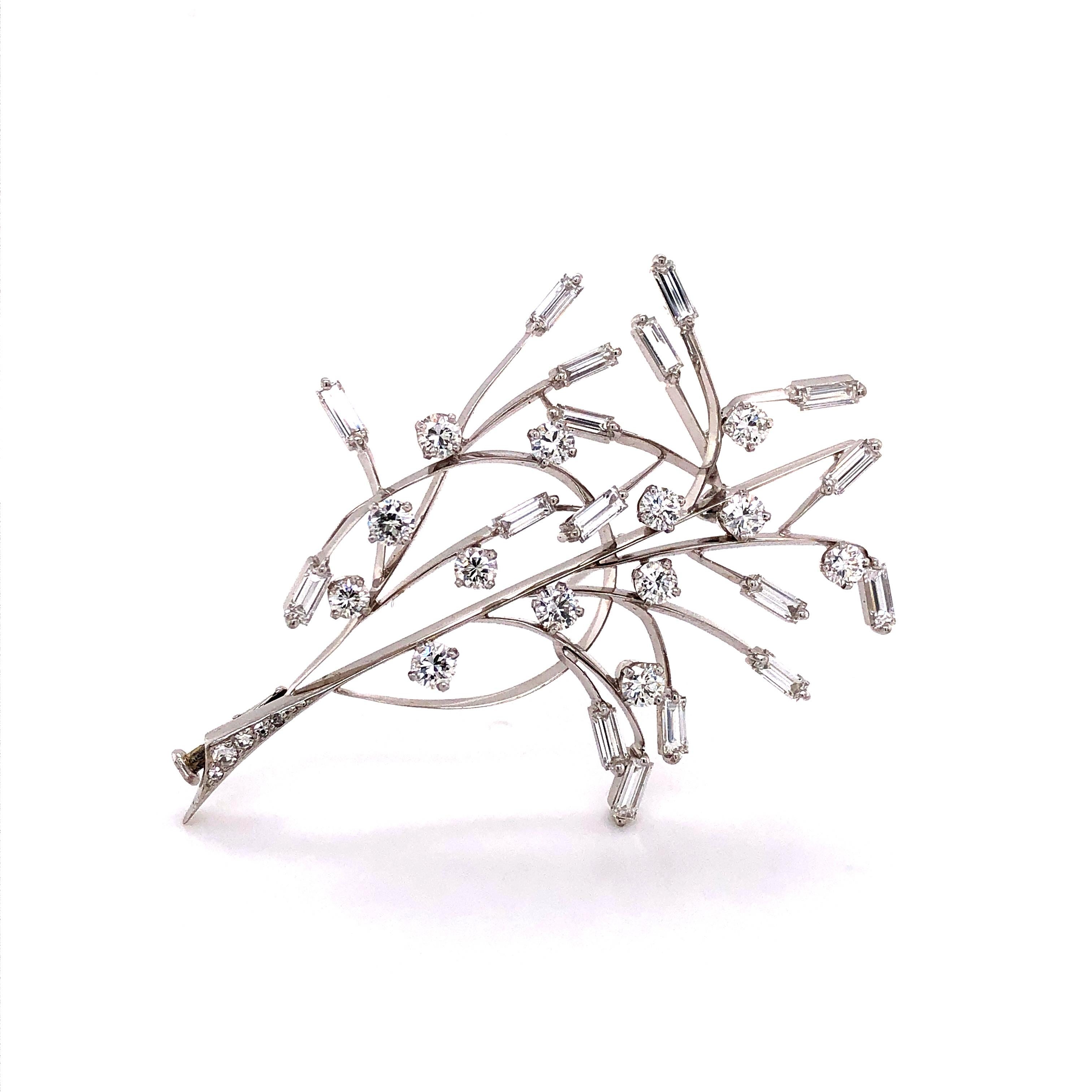 This little Diamond Tree in White Gold 750 is set with 13 Brilliants approximate 1.30 ct, 17 Baguette cut Diamonds approximate 1.70 ct and 5 single cut Diamonds (Quality: G/H-vs).  Imagine wearing this brooch on a little black dress the filigree