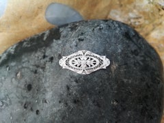 Broche en or blanc 18 carats sertie de diamants