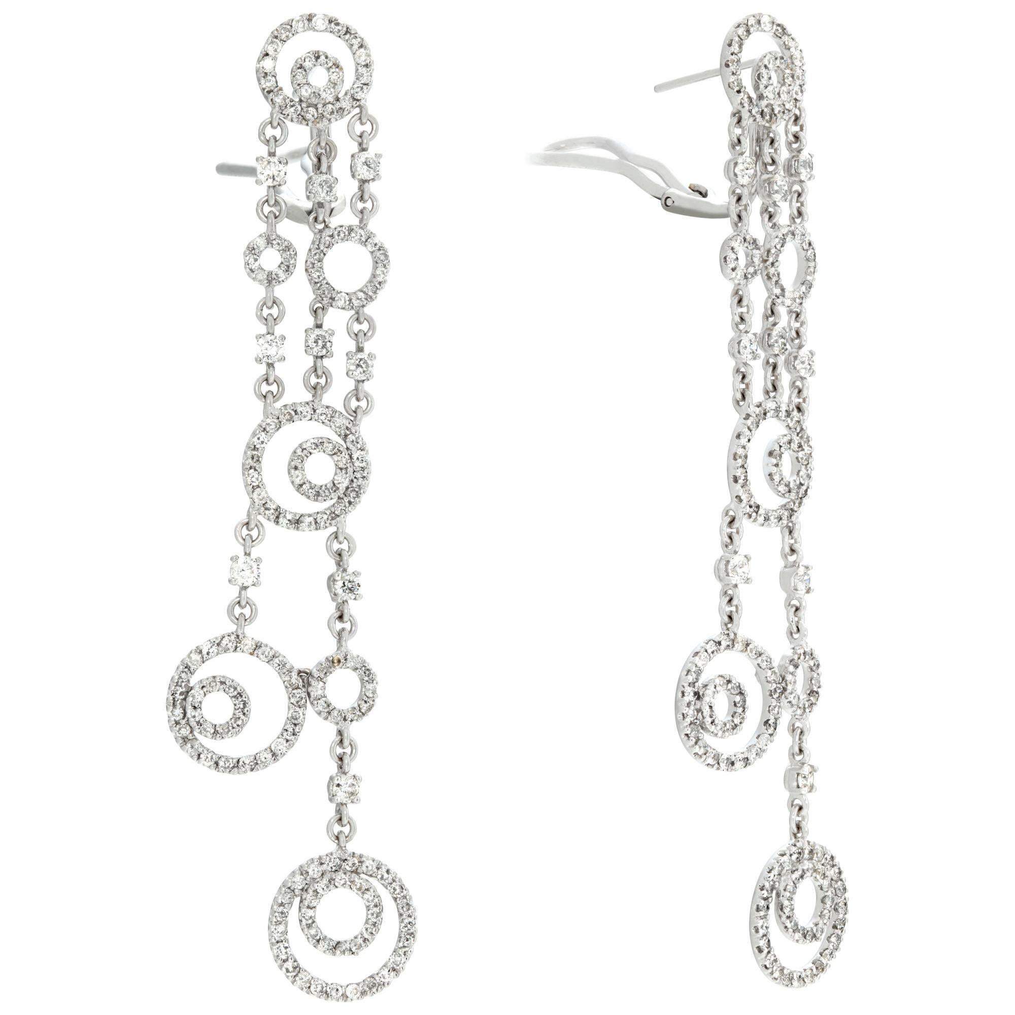 Dangling diamond bubble drop earrings in 18k white gold. Approximately 2.50 carats in round G-H color, VS clarity diamonds. Hanging length is 3.25 inches.