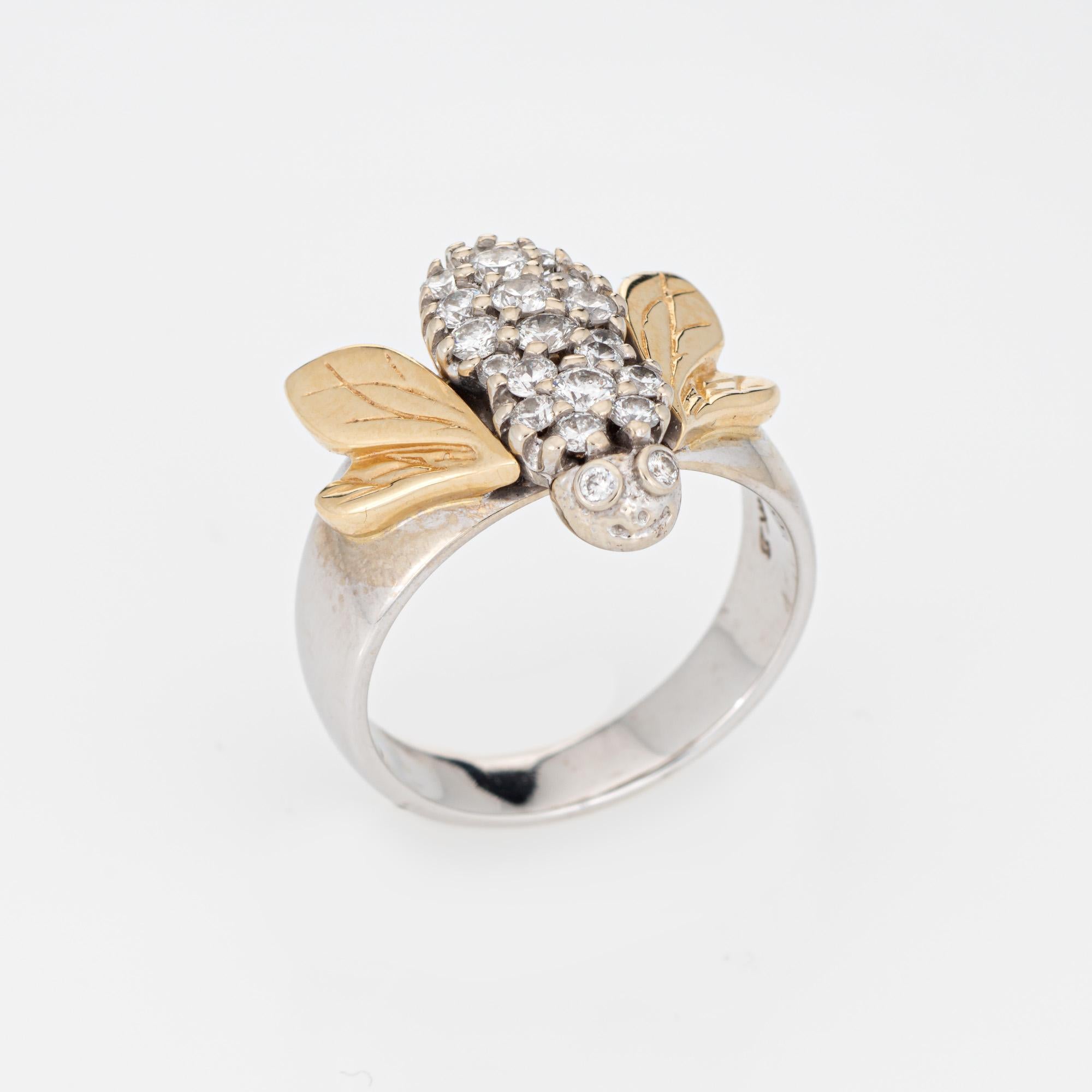 Stylish bumble bee cocktail ring, crafted in 14 karat white & yellow gold. 

Round brilliant cut diamonds total an estimated 0.65 carats (estimated at H-I color and SI1-I1 clarity).

