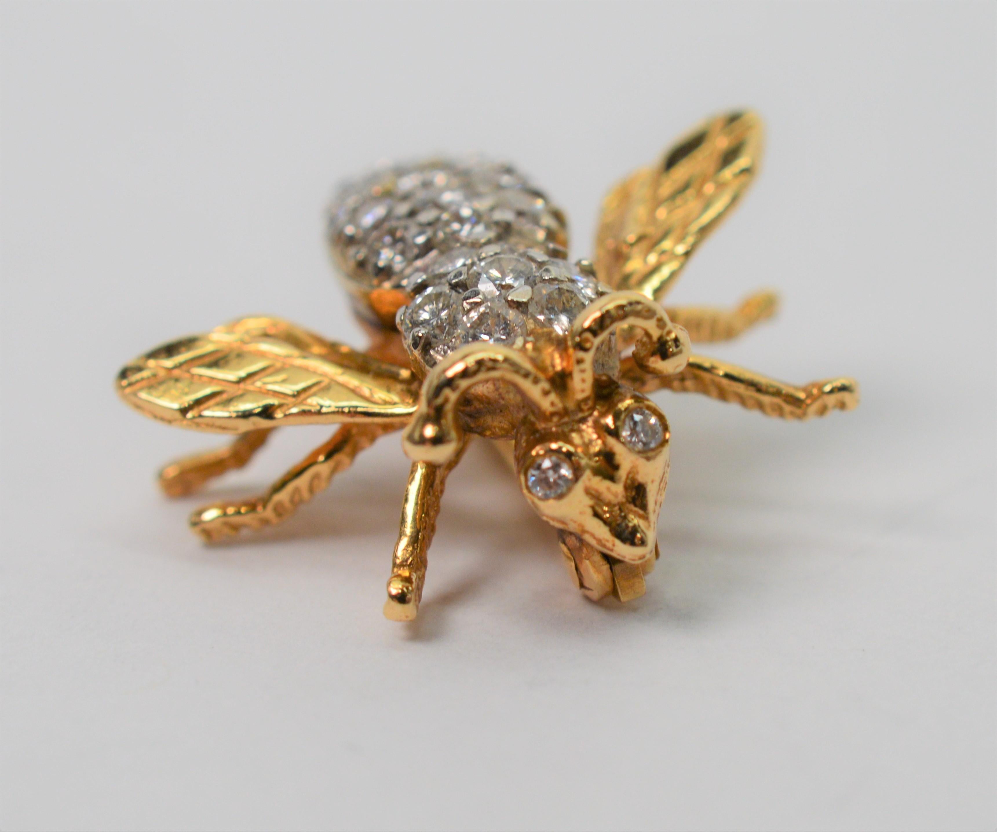 Be all the buzz wearing this adorable diamond covered fourteen karat 14K yellow gold bumble bee pin brooch. With gold wings, six legs and antenna, this 7/8 inch queen bee sparkles with twenty H/VS fine white diamonds, for a total weight of .60