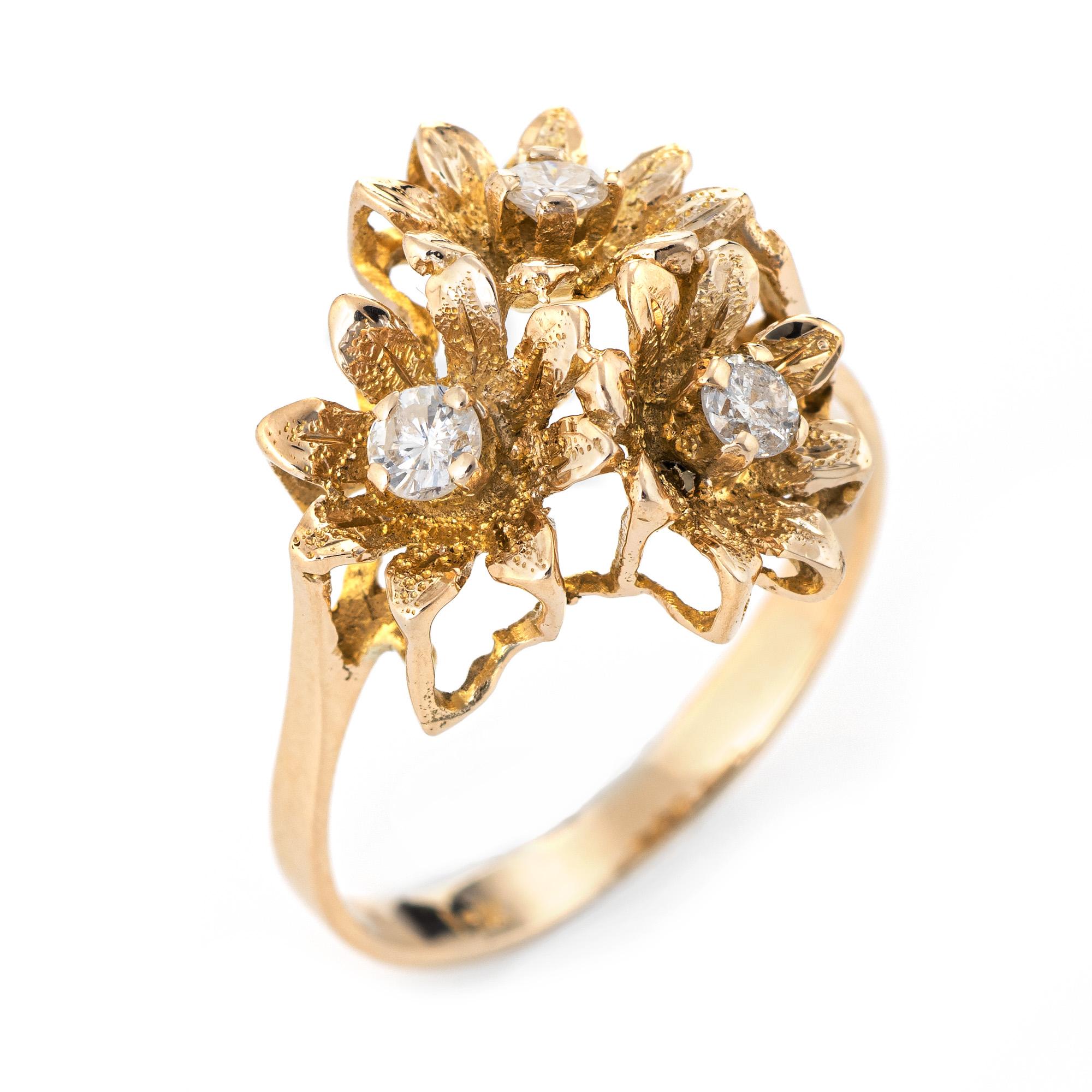 Stylish vintage diamond buttercup cocktail ring crafted in 10 karat yellow gold. 

Three diamonds are estimated at 0.08 carats each and total an estimated 0.24 carats (estimated at H-I color and VS2-SI2 clarity). 

The diamonds are set in three