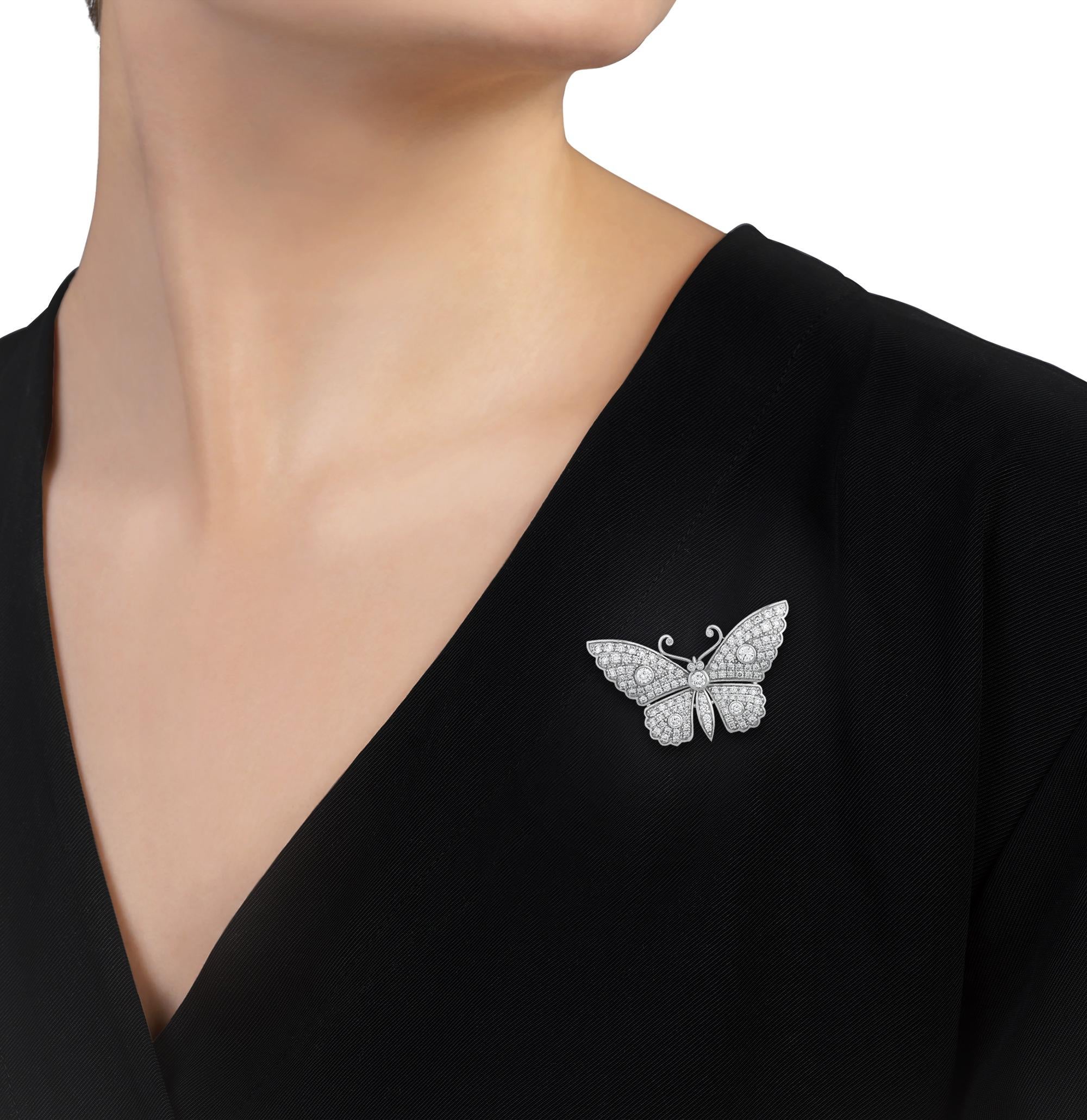 This exquisite butterfly brooch showcases exceptional design and craftsmanship. Adorned with approximately 3.14 carats of dazzling diamonds, displaying G-H color and VS1-SI1 clarity, this pin is masterfully crafted in 18K white gold and appears