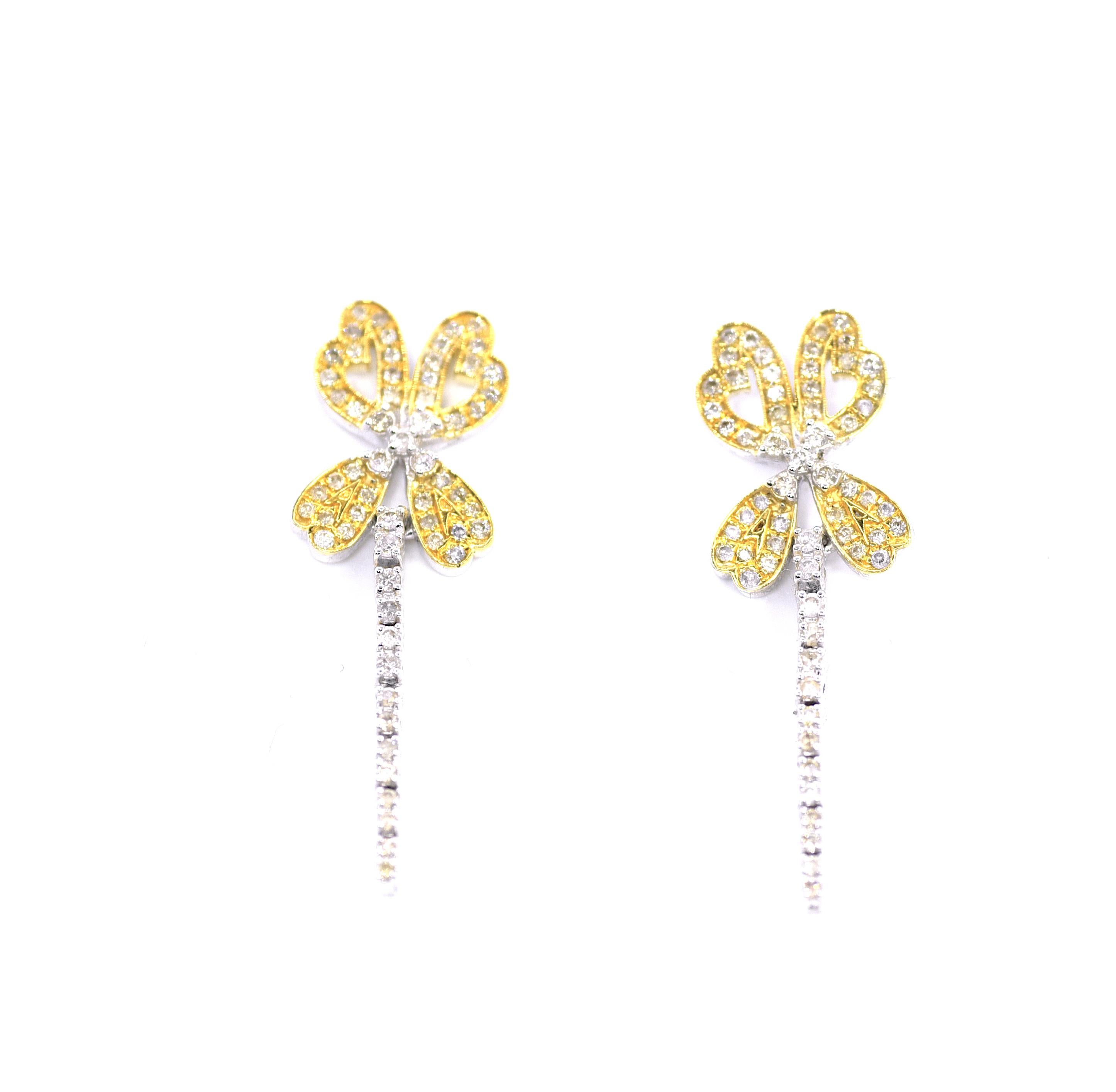 These unique butterfly diamond dangler earrings with 0.62 ct of sparkling  diamonds set in 18k fine white gold are effortlessly charming. 
Most of our jewels are made to order, so please allow us for a 2-4 week delivery.
Please note the possibility