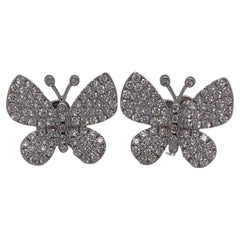 Boucles d'oreilles papillon en or blanc 18 carats et diamants