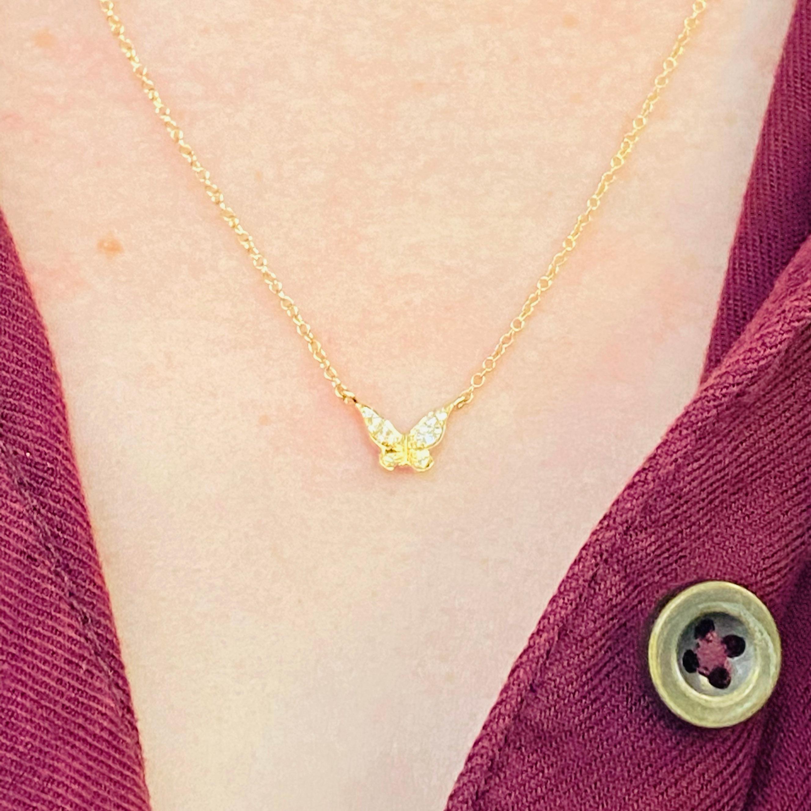 This gorgeous 14k yellow gold butterfly pendant with pave diamonds is sure to put a smile on anyone's face! This necklace looks beautiful worn by itself and also looks wonderful in a necklace stack. Its amazing adjustable chain design allows it to