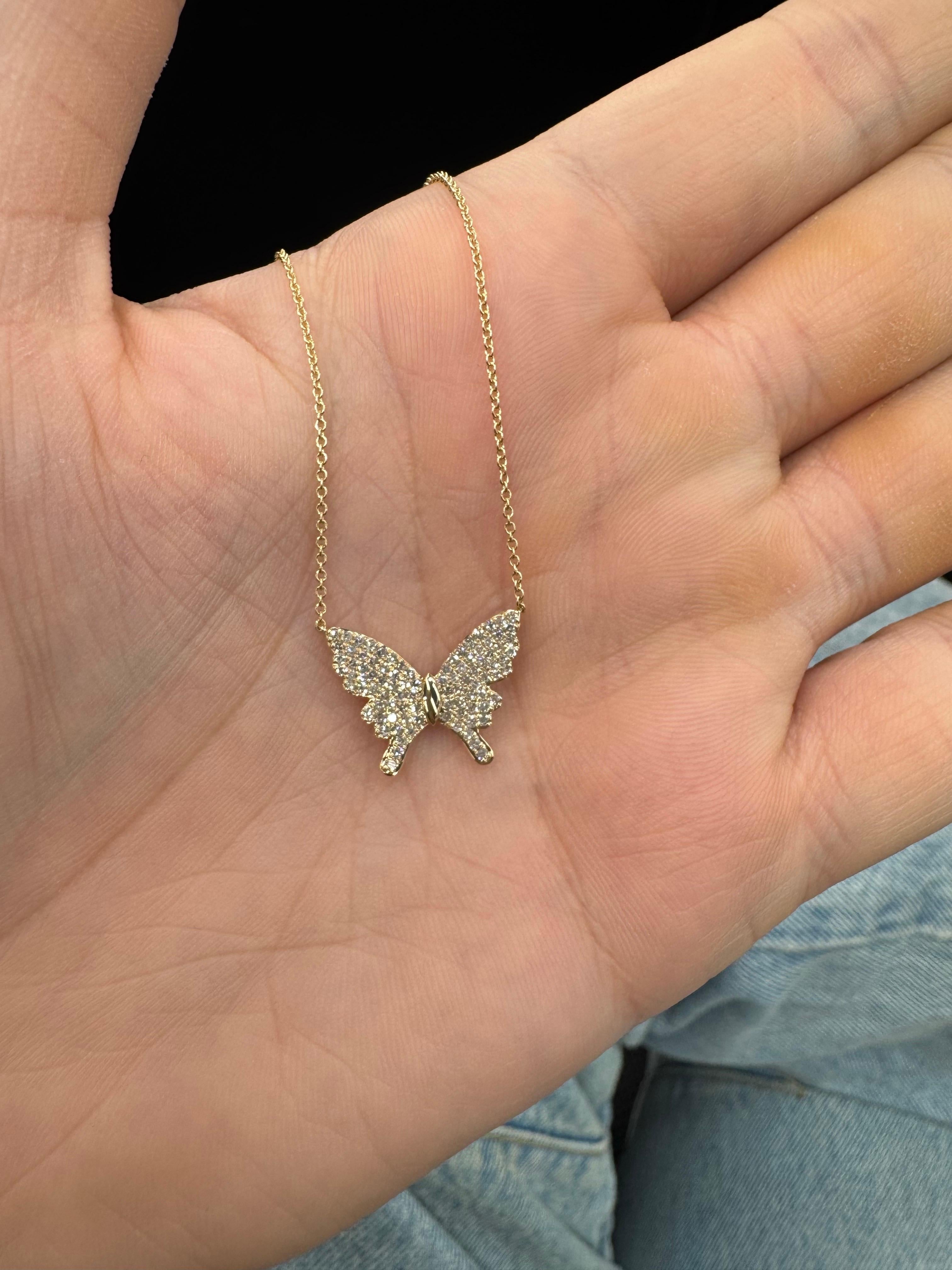 Delicate, symbolic, and full of sparkle — this enchanting butterfly pendant necklace is crafted in fine 14K yellow gold and adorned with 92 brilliant round diamonds totaling 0.35 carats. The butterfly, a timeless symbol of transformation and beauty,