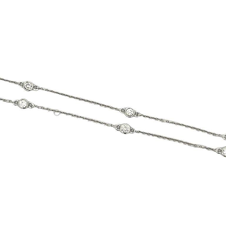 A classic design that never goes out of style. Sparkling with bezel-set round brilliant-cut diamonds in 0.38 total carat weight stationed on a 14-carat white gold cable chain, it's a must-have necklace for your collection. It's also perfect for
