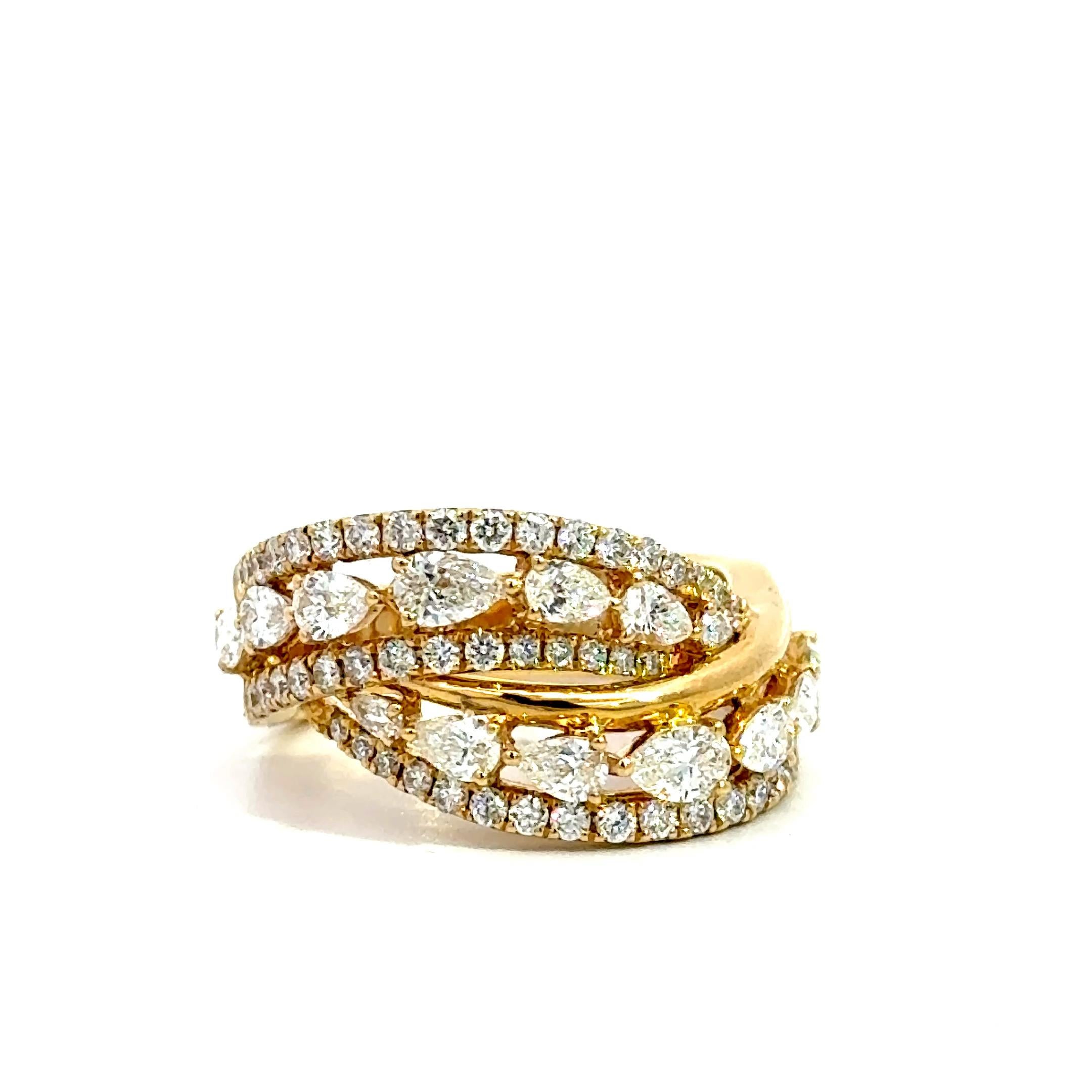 One of a kind Diamond ByPass Ring In 18 Karat Yellow Gold. 

The details are as follows : 

Total Diamond weight : 1.75 carats 
Fancy cut diamond weight : 1.16 carats 
Metal : 18 karat yellow gold 
