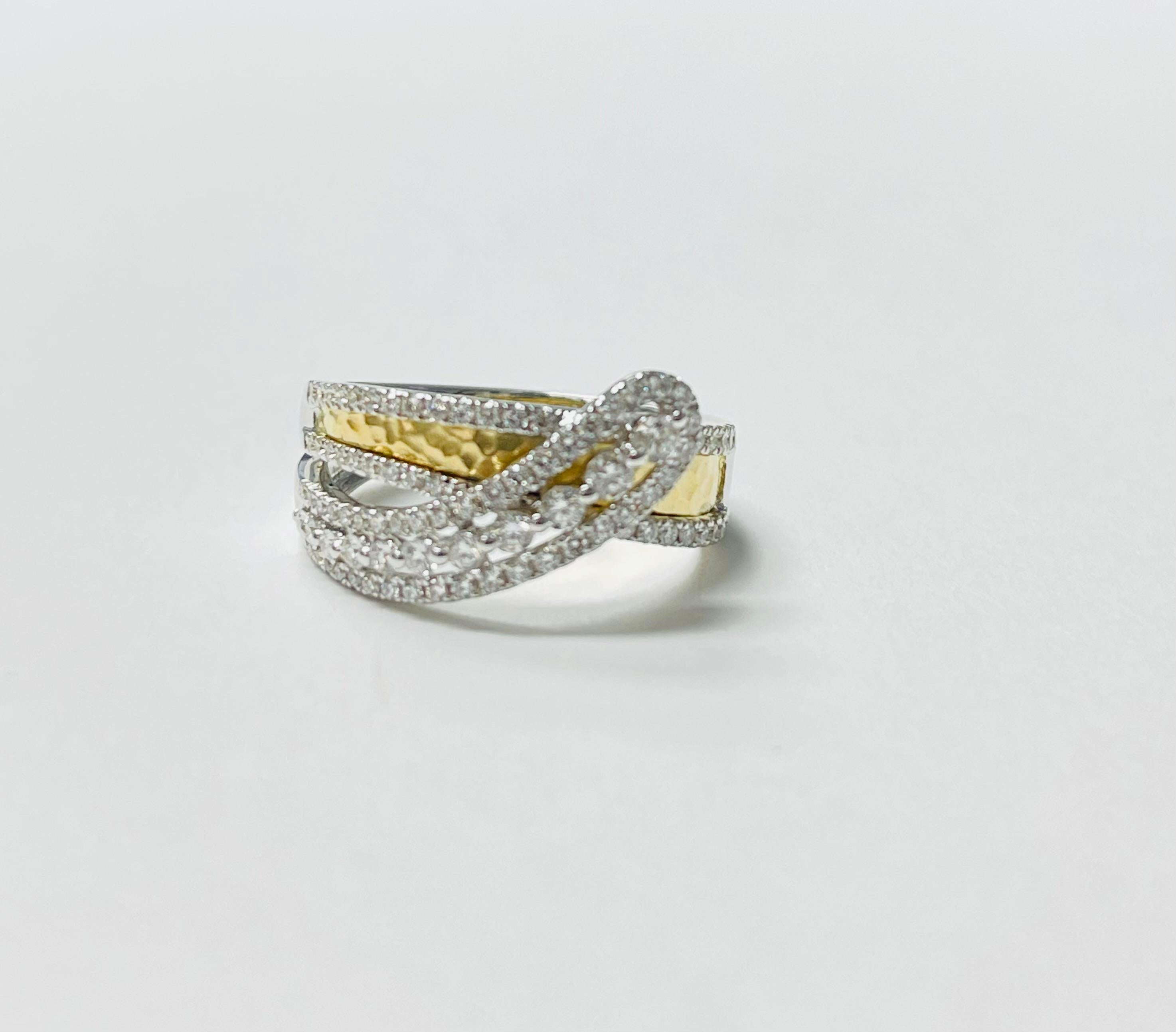 Very pretty Diamond Bypass ring beautifully hand crafted in 18 Karat White and Yellow Gold. 

Diamond weight : 0.68 carat ( G color and VS clarity ) 
Metal : 18 Karat White and yellow gold
Ring size : 6.5 

