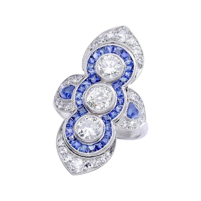 Diamantring mit kalibriertem Saphir im Angebot