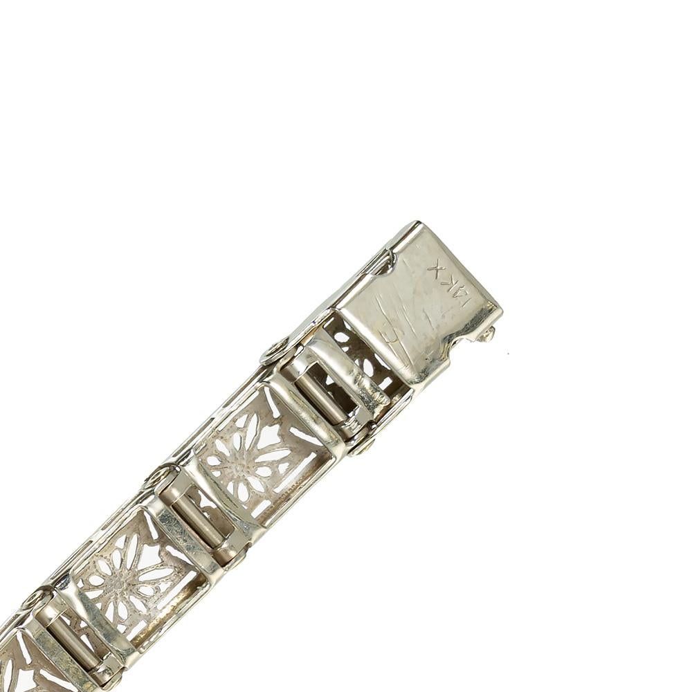 Women's Diamond Calibre Sapphire White Gold Filigree Bracelet For Sale