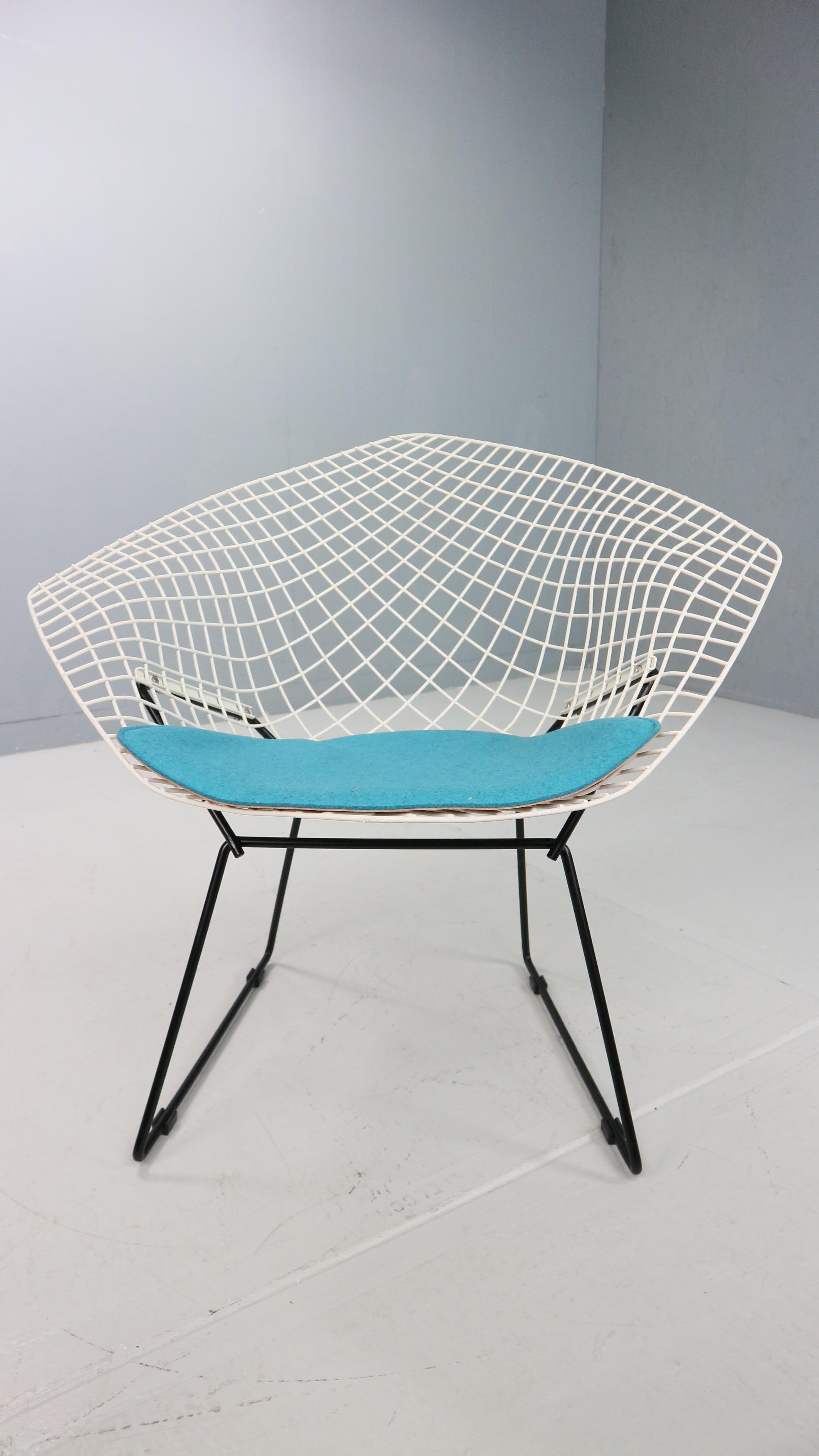 An old and original Diamond Chair, designed by Harry Bertoia. U.S.A., Knoll International, 1960s

The Bertoia Diamond Armchair, originally designed in 1952 is one of the most iconic designs by Harry Bertoia, who was not only a furniture designer but