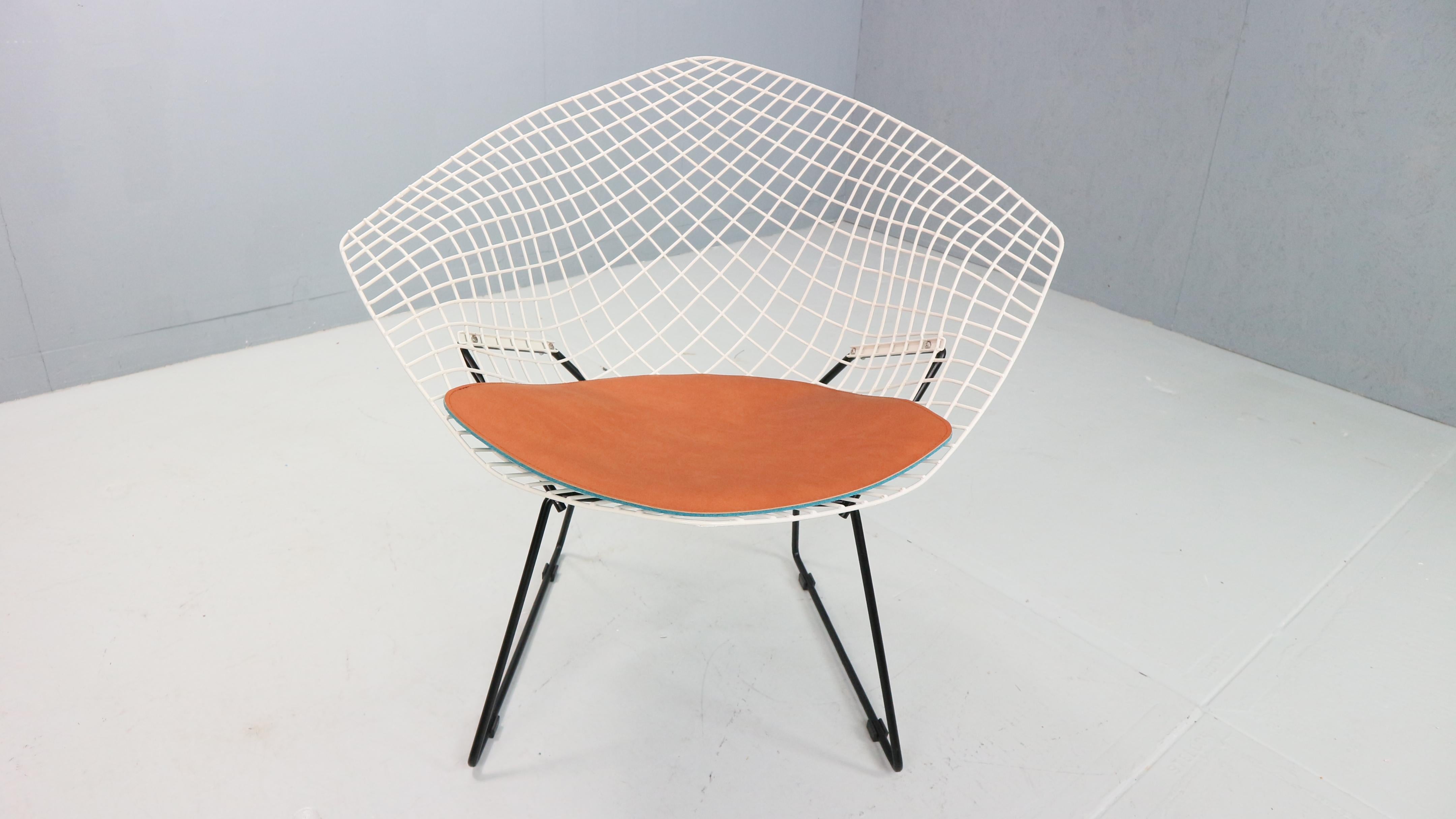 An old and original Diamond Chair, designed by Harry Bertoia. U.S.A., Knoll International, 1960s

The Bertoia Diamond Armchair, originally designed in 1952 is one of the most iconic designs by Harry Bertoia, who was not only a furniture designer but