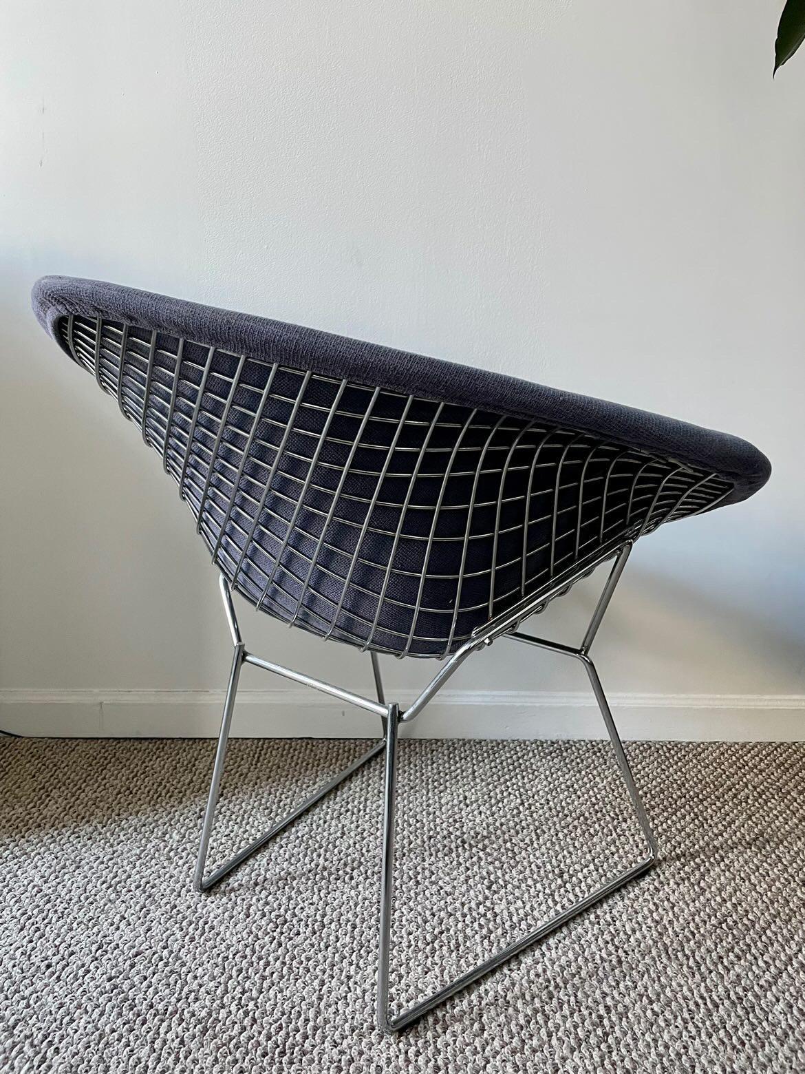 Diamond chair with full cover in lovely purple-grey upholstery. Labeled Knoll