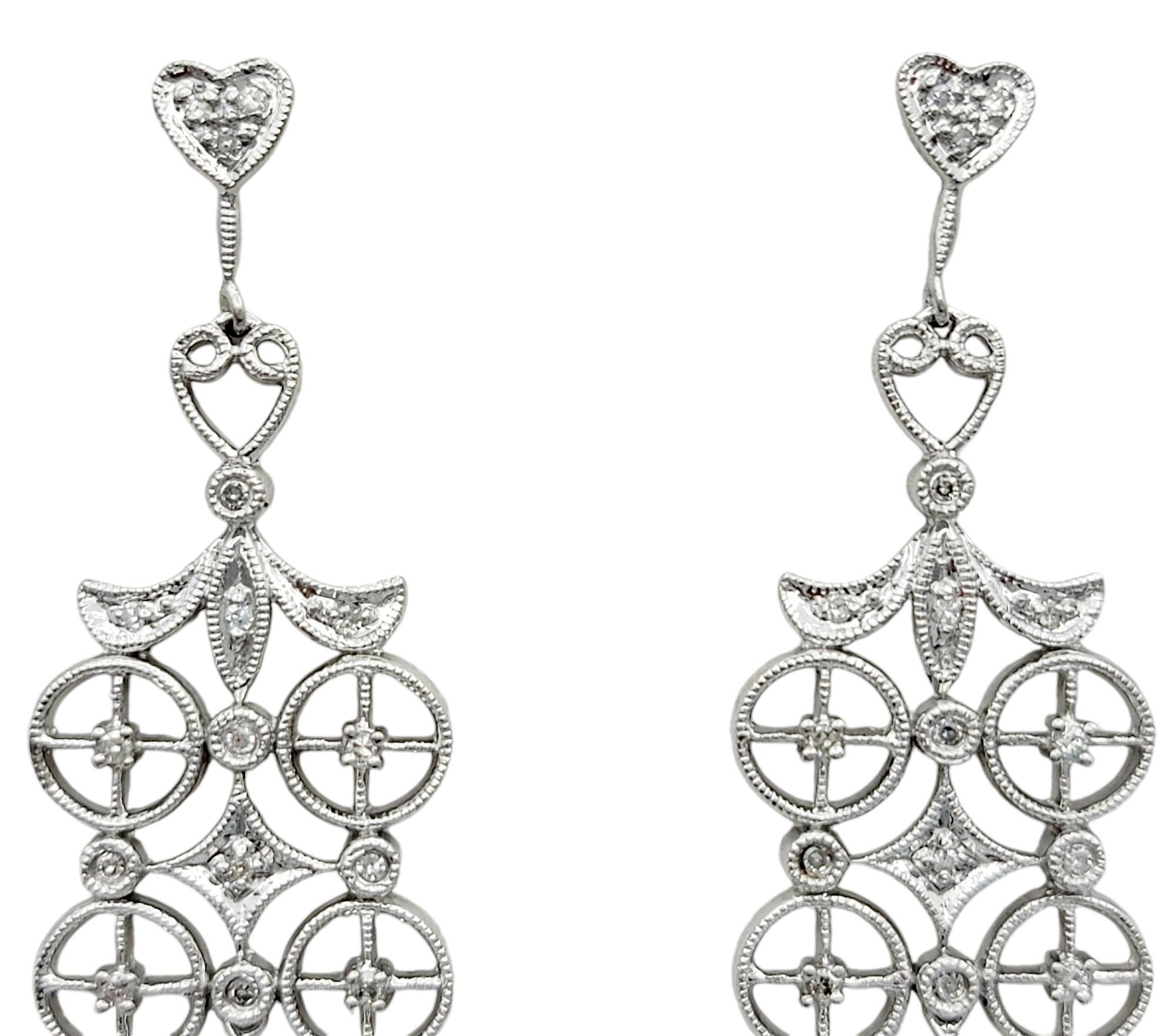 Step into a world of refined luxury with these mesmerizing chandelier earrings, a true masterpiece crafted in 14 karat white gold. Designed for the discerning jewelry lover, these earrings offer an exquisite combination of classic elegance and