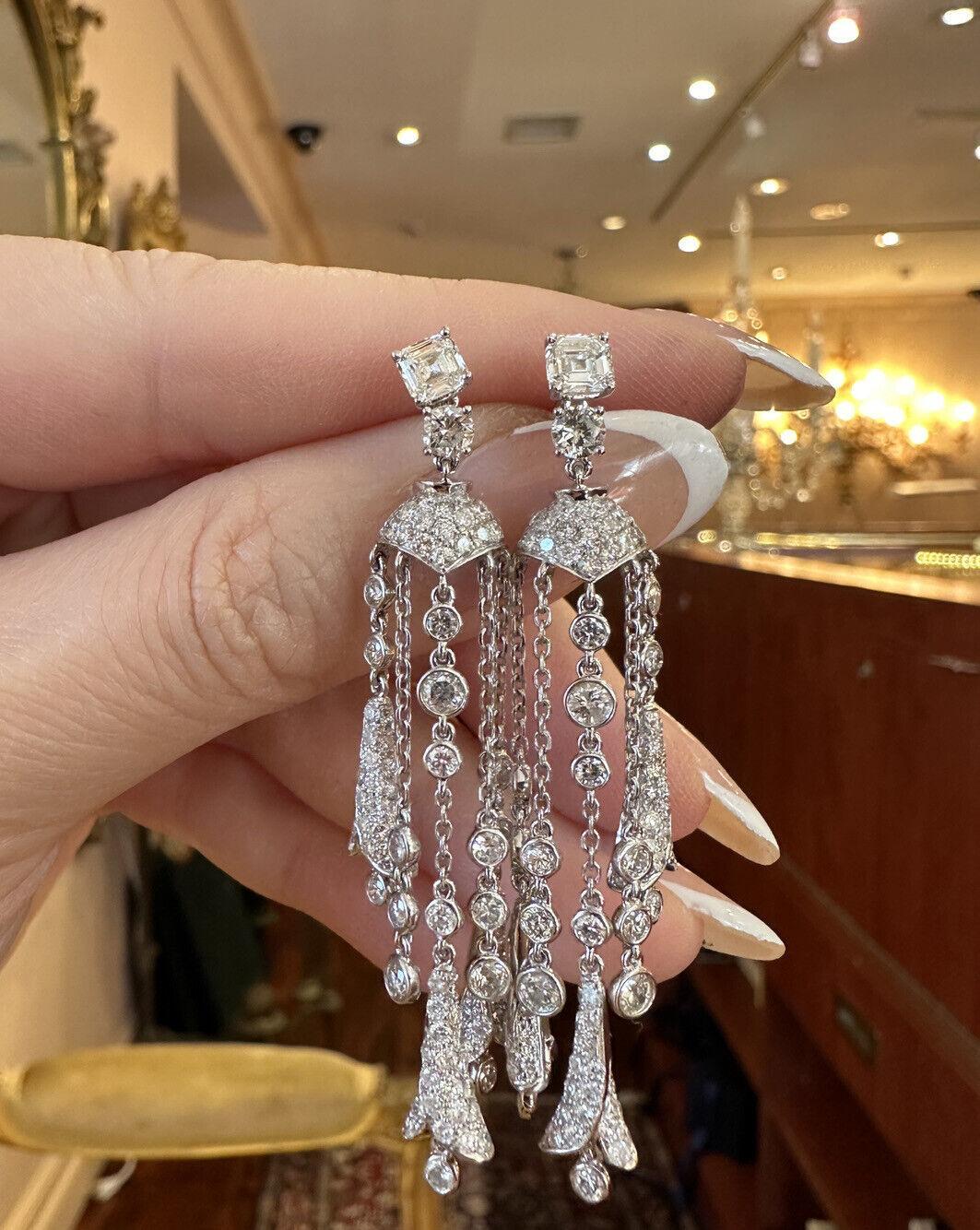 Diamond Chandelier Drop Earrings 5.25 Carat Total Weight in 18k White Gold 

Diamond Chandelier Earrings feature a single Asscher Cut and Round Brilliant Diamond at the top with chandelier of Pave diamond sections and bezel set diamonds hanging on