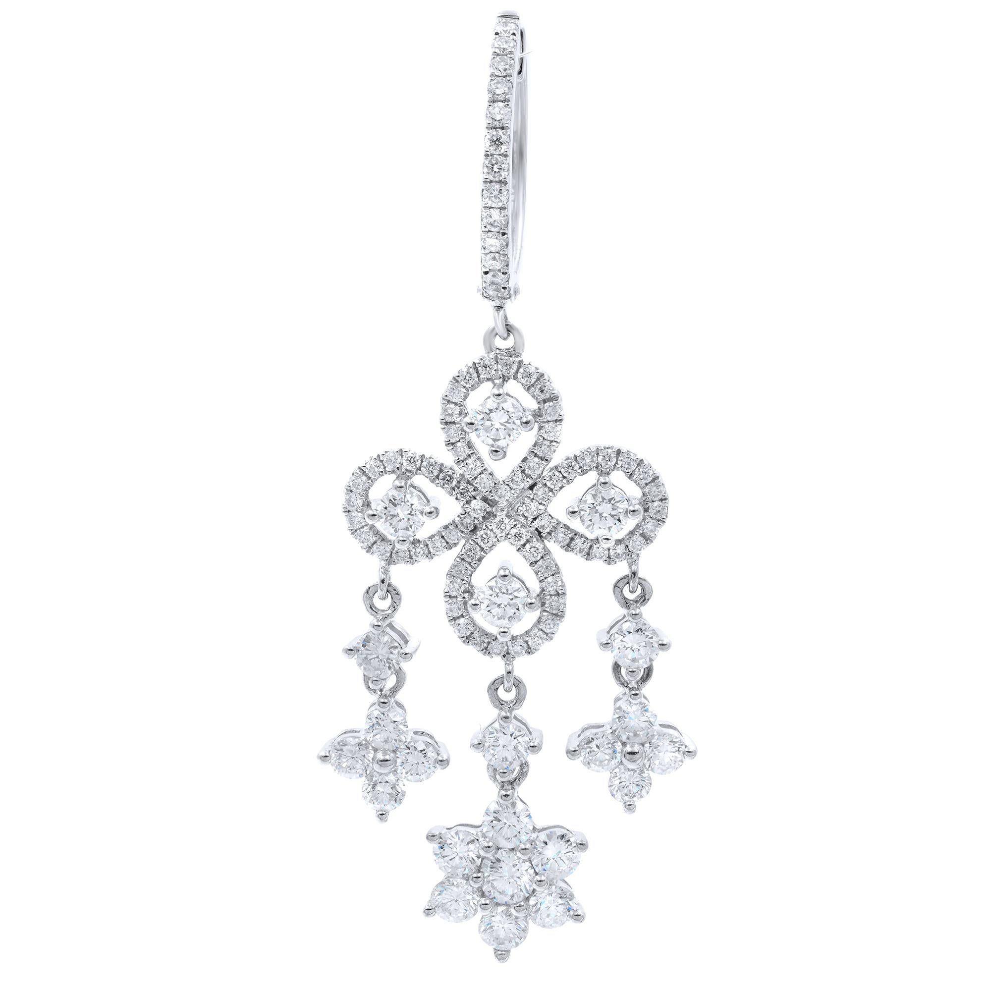 These beautiful diamond earrings make a statement outfit look complete. Make a grand entrance whenever you walk in the room wearing these fabulous absolutely stunning pair of finely crafted earrings. Made in 18k white gold featuring absolutely white