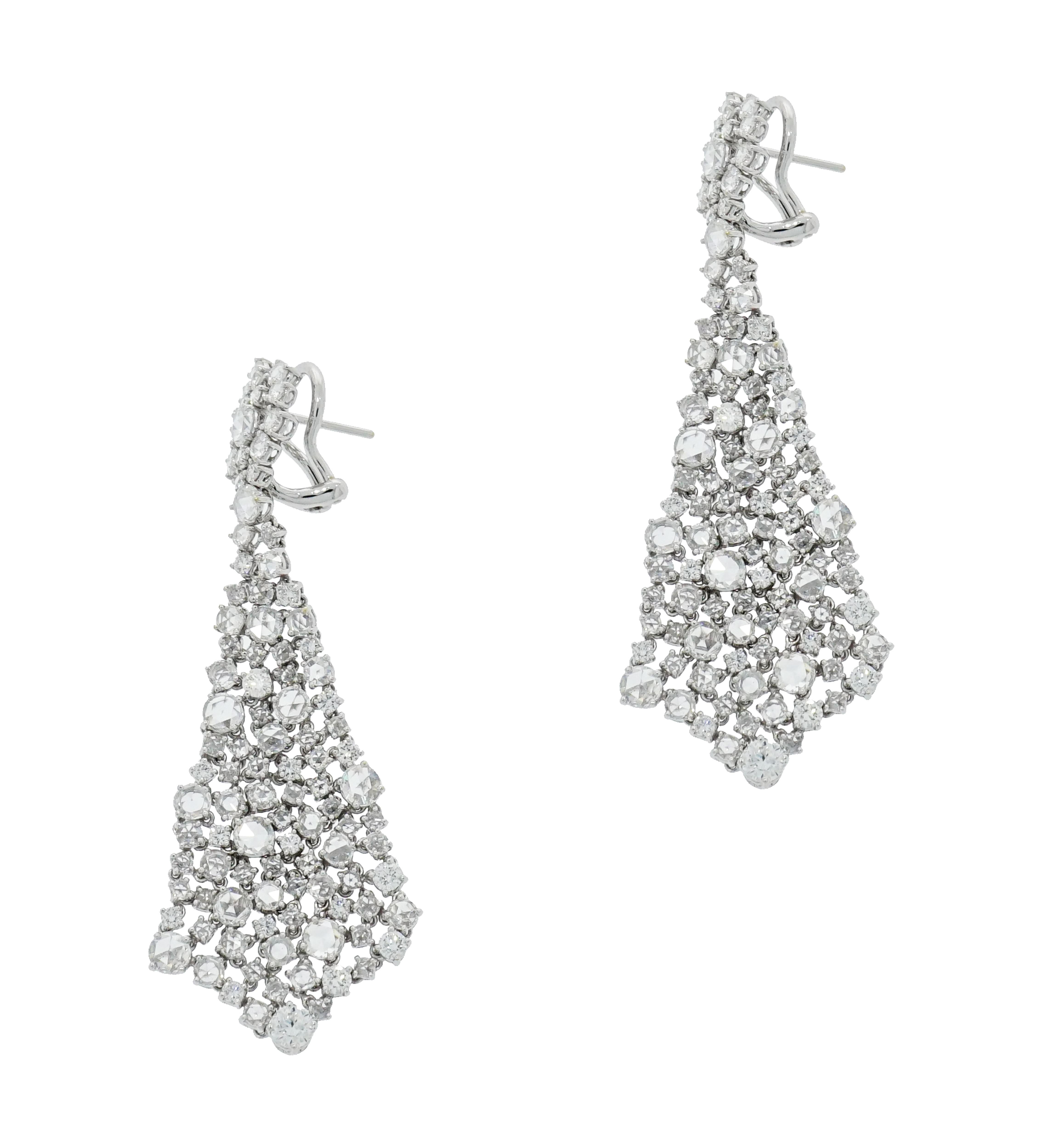 Spring is here and sparkles are in full bloom!!!
This gorgeous chandelier earrings is set with 9.54 carats of rose cut diamonds and accented with round brilliant cut diamonds in a fluid handmade 18k white gold setting.
The earrings have an omega