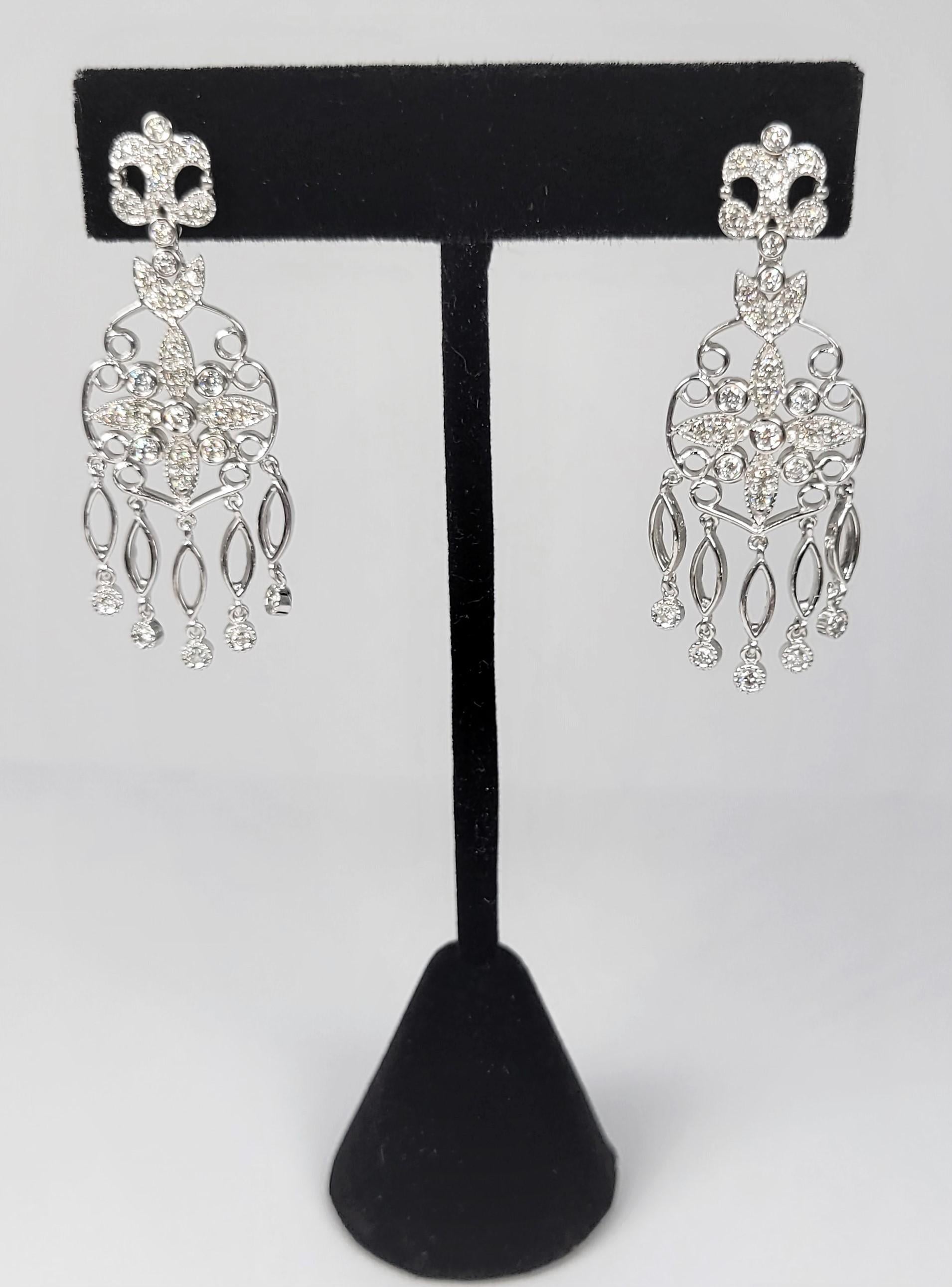 Chandelier earrings with 0.60 carats of diamonds in 14 karat white gold.  The perfect compliment to any black tie affair!