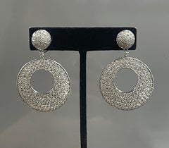Diamond chandelier earrings in 18 Karat White Gold.
