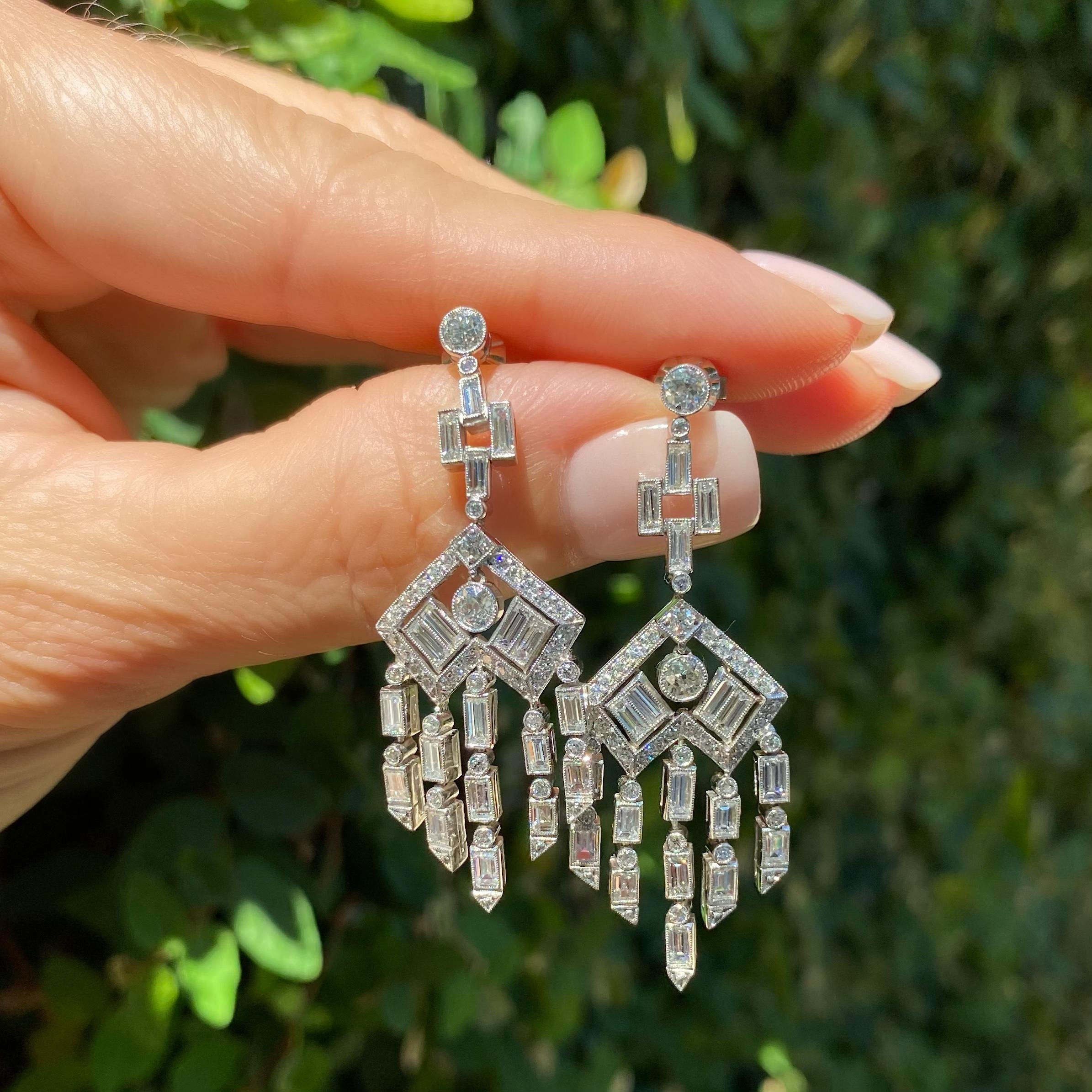 Simply Beautiful!  Chandelier Diamond Drop Earrings. Beautifully Hand crafted in Platinum. Hand set with alternating baguette and round Diamonds; 38 baguette Diamonds approx. 3.05tcw and 30 old European and round Diamonds approx. 1.88tcw. Approx.