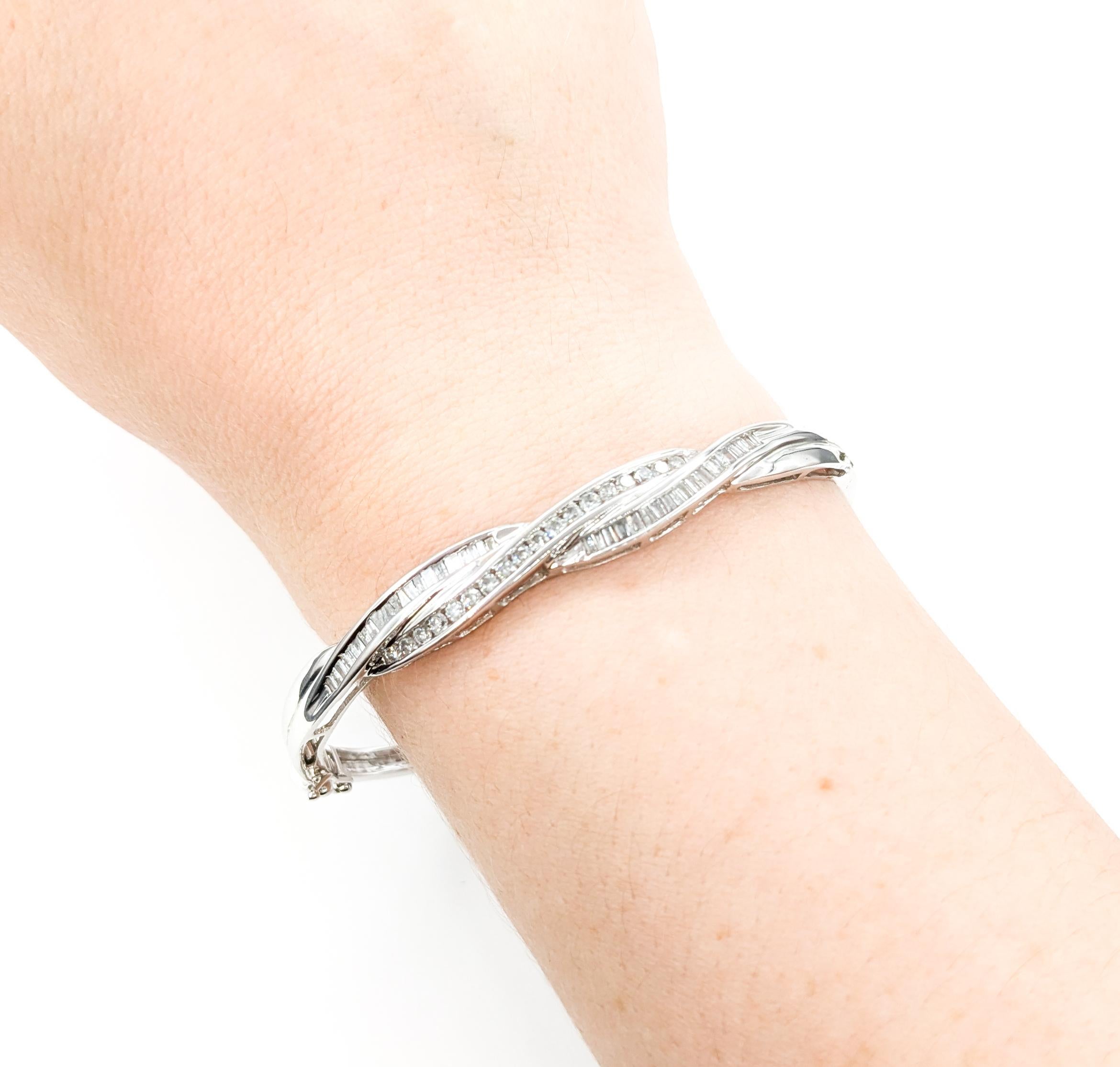 Diamond Channel Twist Bangle Bracelet In White Gold

Introducing this beautiful diamond twist bracelet crafted in 14kt white gold. The bracelet features 1.00ctw diamonds intricately channel set, creating a stunning and continuous sparkle. The