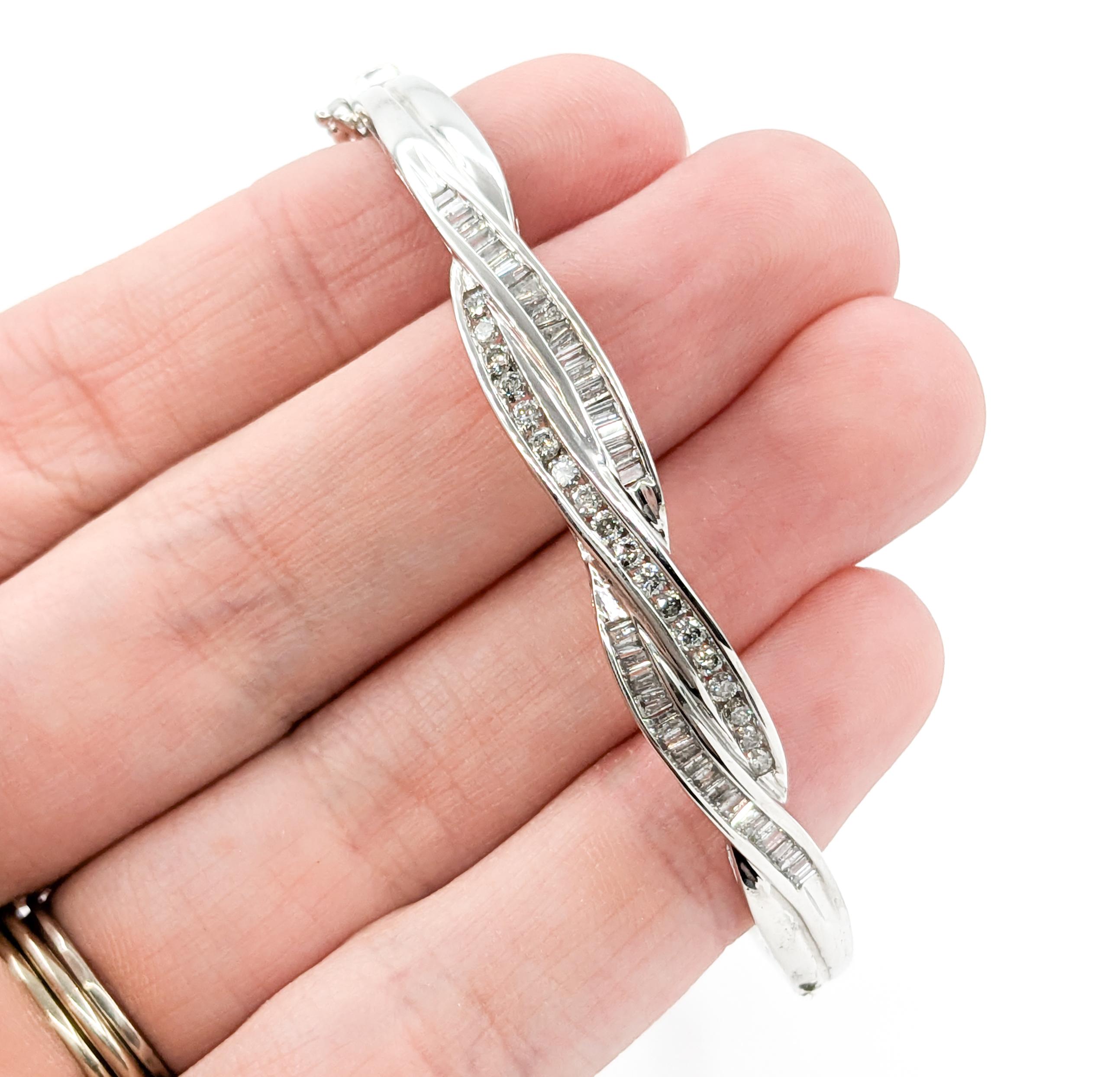 Round Cut Diamond Channel Twist Bangle Bracelet In White Gold For Sale