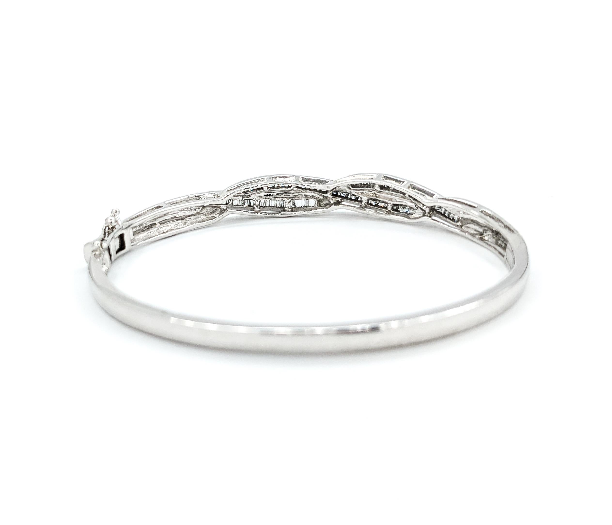 Women's Diamond Channel Twist Bangle Bracelet In White Gold For Sale
