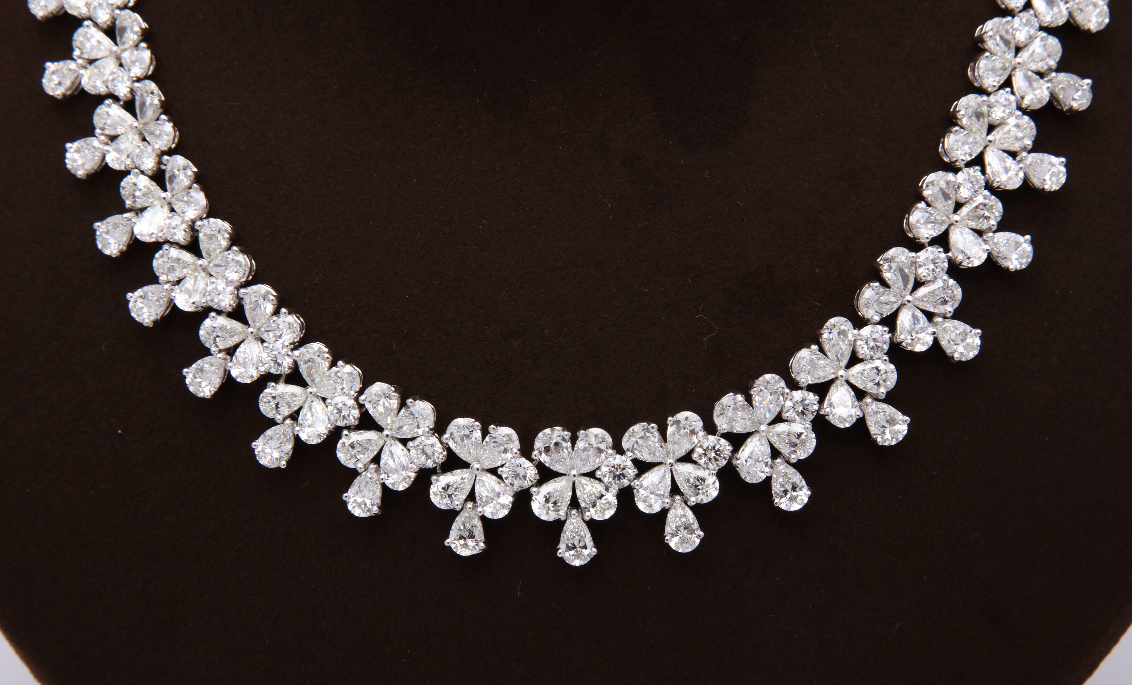 

A BEAUTIFUL piece!!

60.17 carats of white pear shaped and round brilliant cut diamonds set in platinum.

A timeless necklace that will compliment other jewelry in your collection. 

16.5 inch length which can be adjusted
