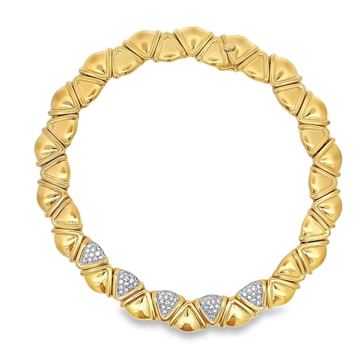 Diamond Choker Necklace

 A necklace featuring triangular gold links with 5 round cut diamond links towards the center.

Measurements: 14