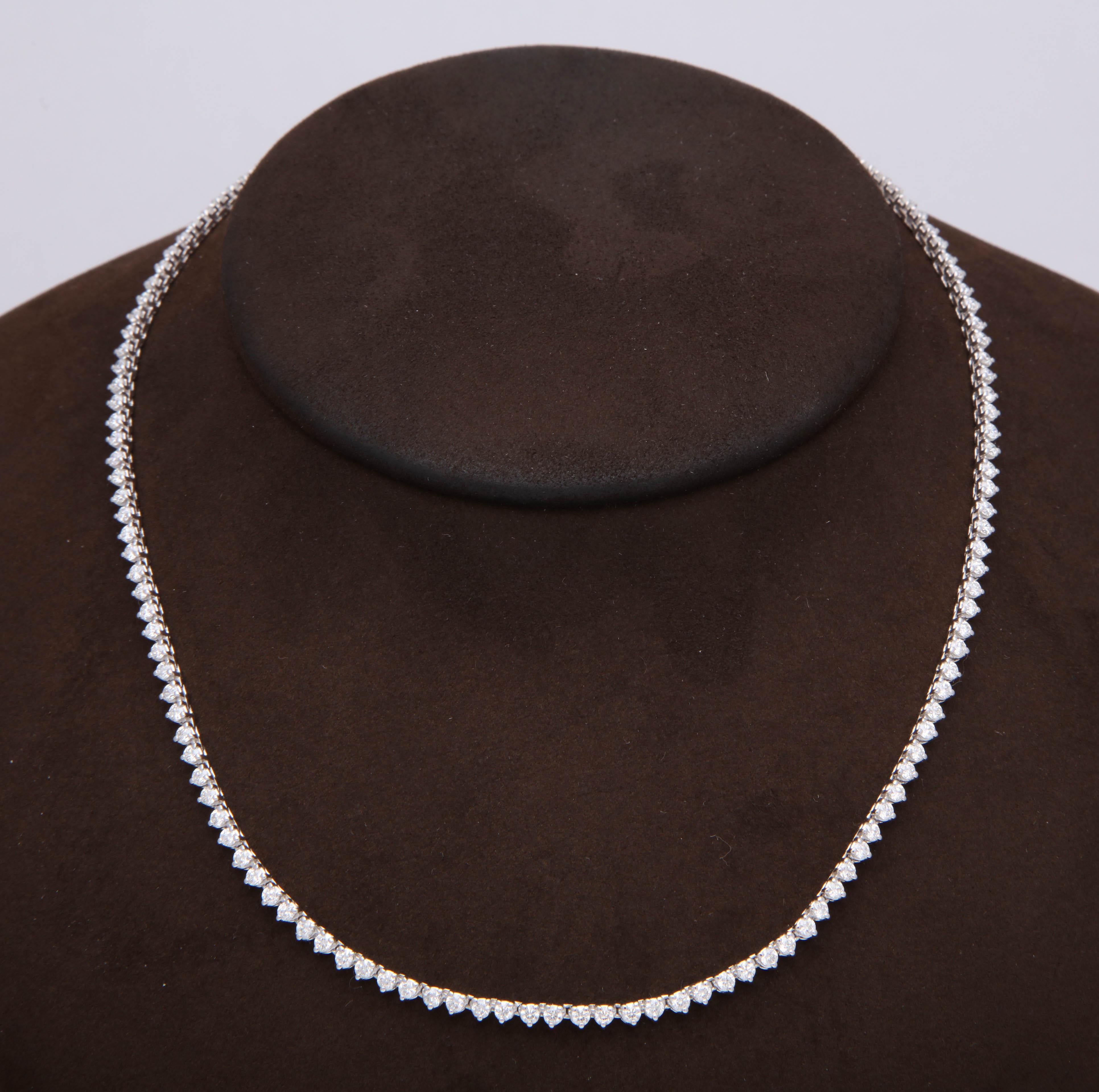 

5.69 carats of white round brilliant cut diamonds set in 14k white gold

A perfect choker necklace that can be worn daily and casually or dressed up. 

Looks great layered with other pieces as well!

16 inch length, can be ordered longer or