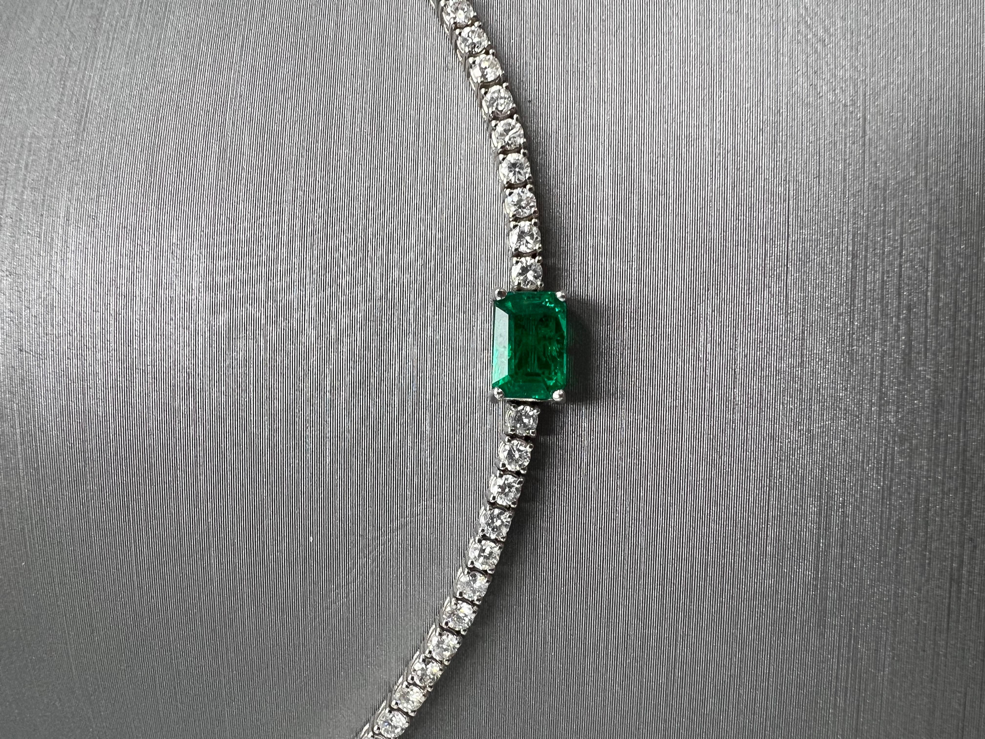 Diamond Choker with a Natural Emerald Gem-stone in 14k White and Natural Diamonds
3.90 Total Carat Weight of Natural Full Brilliant Cut Diamonds
0.91 Total Carat Weight of a Natural Green Emerald
14k White Gold
Adjustable Size: from 13 inches to 17