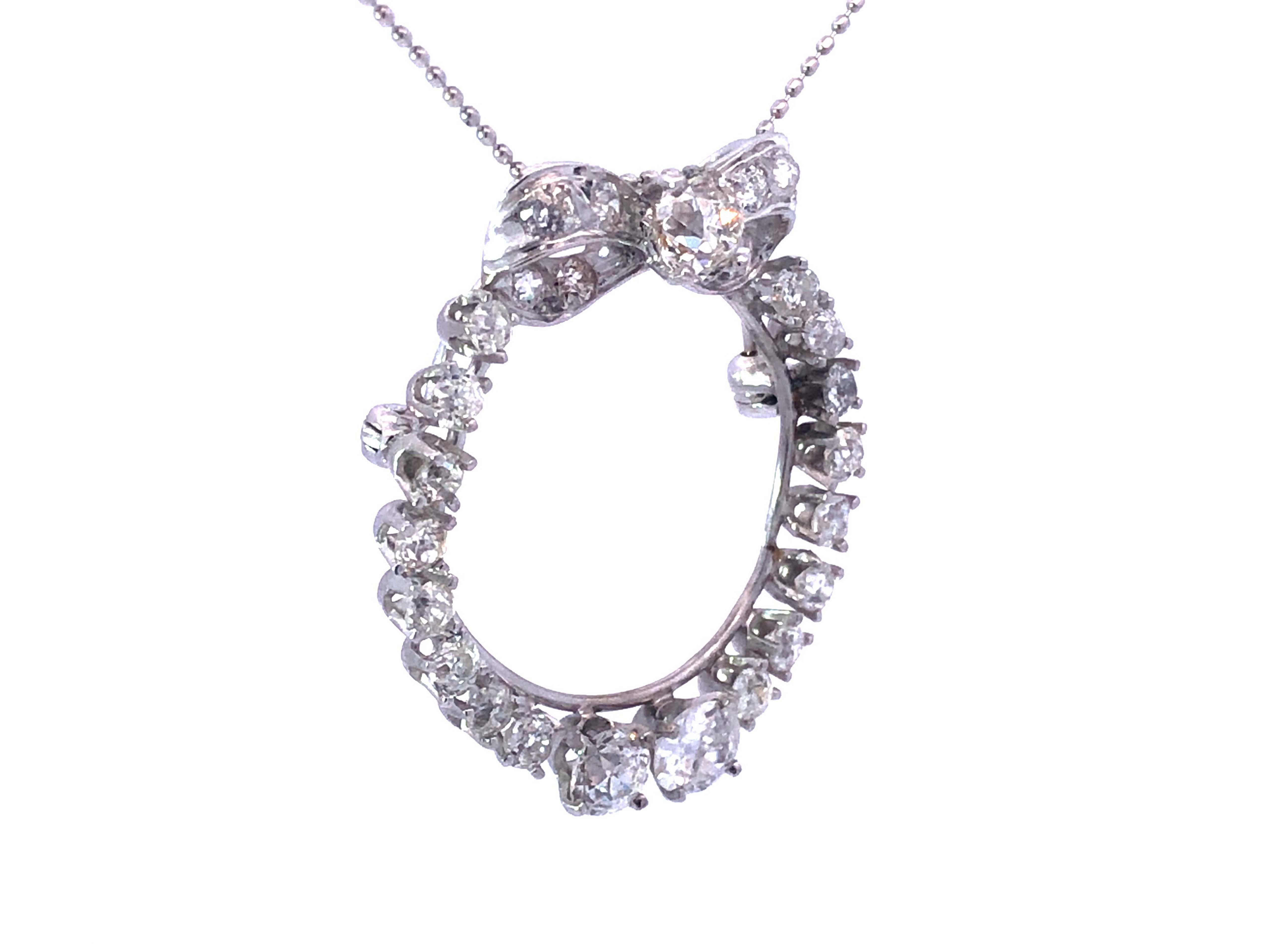 Modern Diamond Circle Bow Necklace in Platinum For Sale