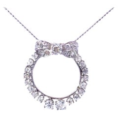 Diamond Circle Bow Necklace in Platinum