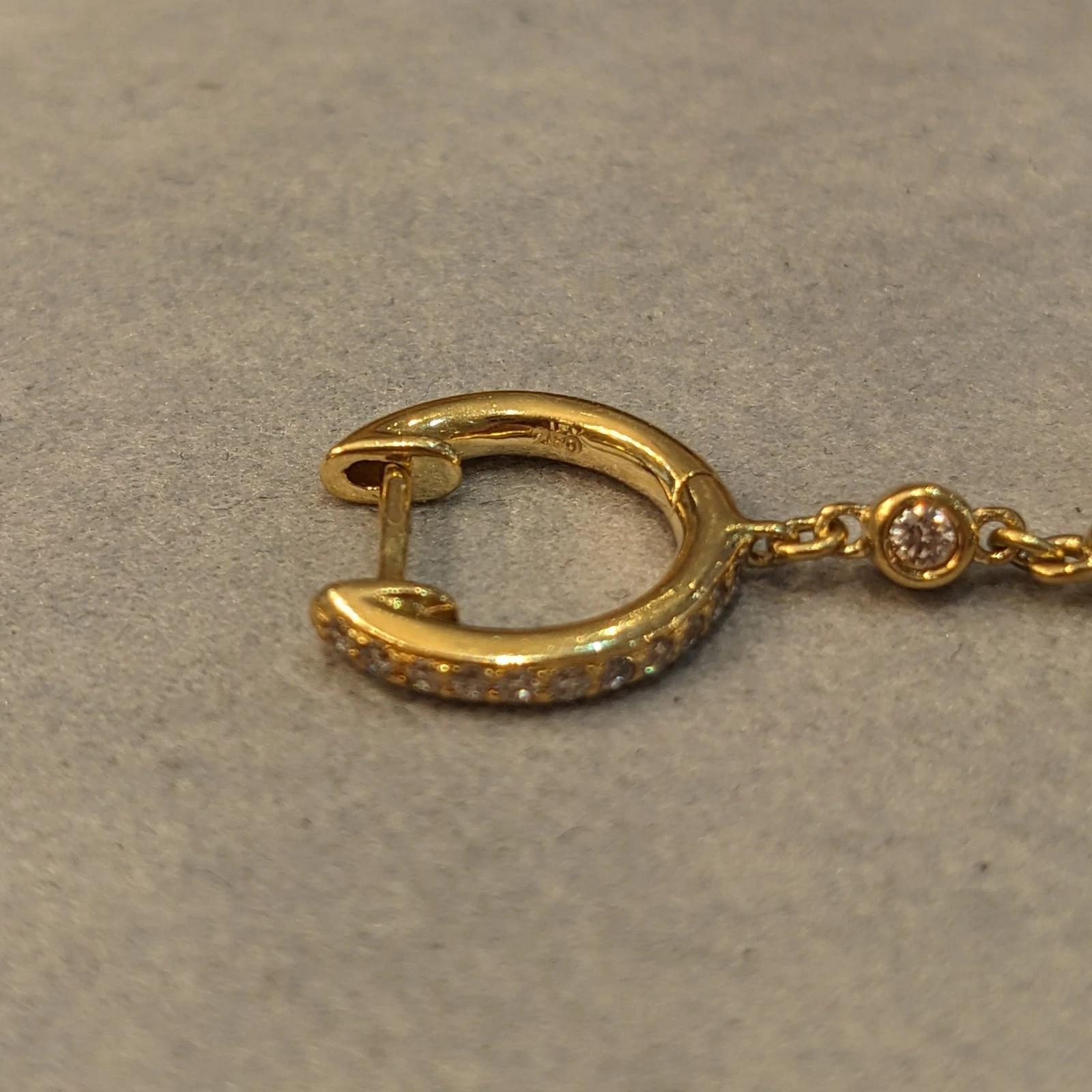 Boucles d'oreilles pendantes en or jaune 18k avec anneau en forme de cercle et diamants en vente 3