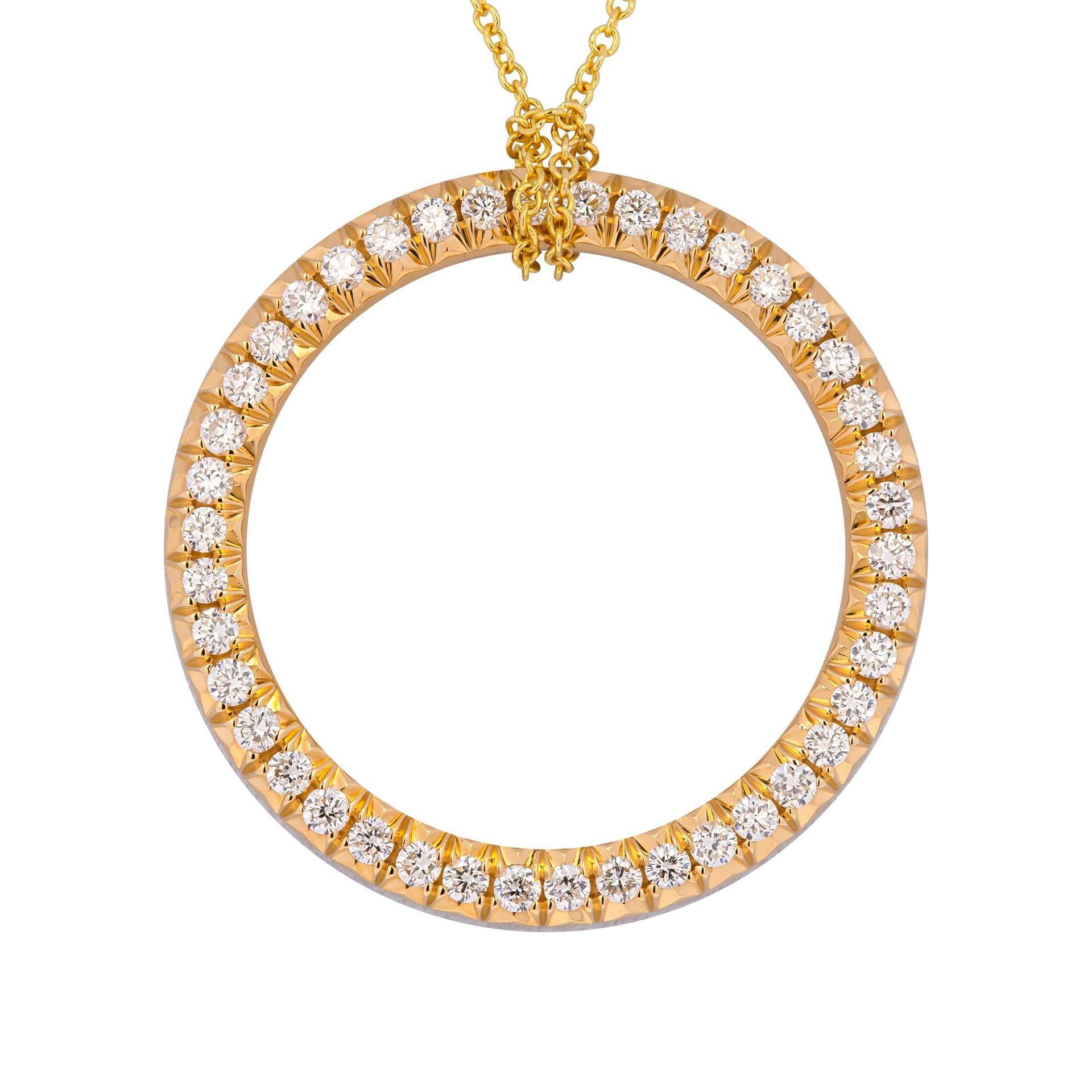 Diamond Circle of Life Necklace
Mounted in 18k Yellow Gold
This open circle pendant, encrusted with 42 round brilliant diamonds set in 18K yellow gold, is a gorgeous example of a classic motif symbolizing eternity and never, ending love. It's 1-inch
