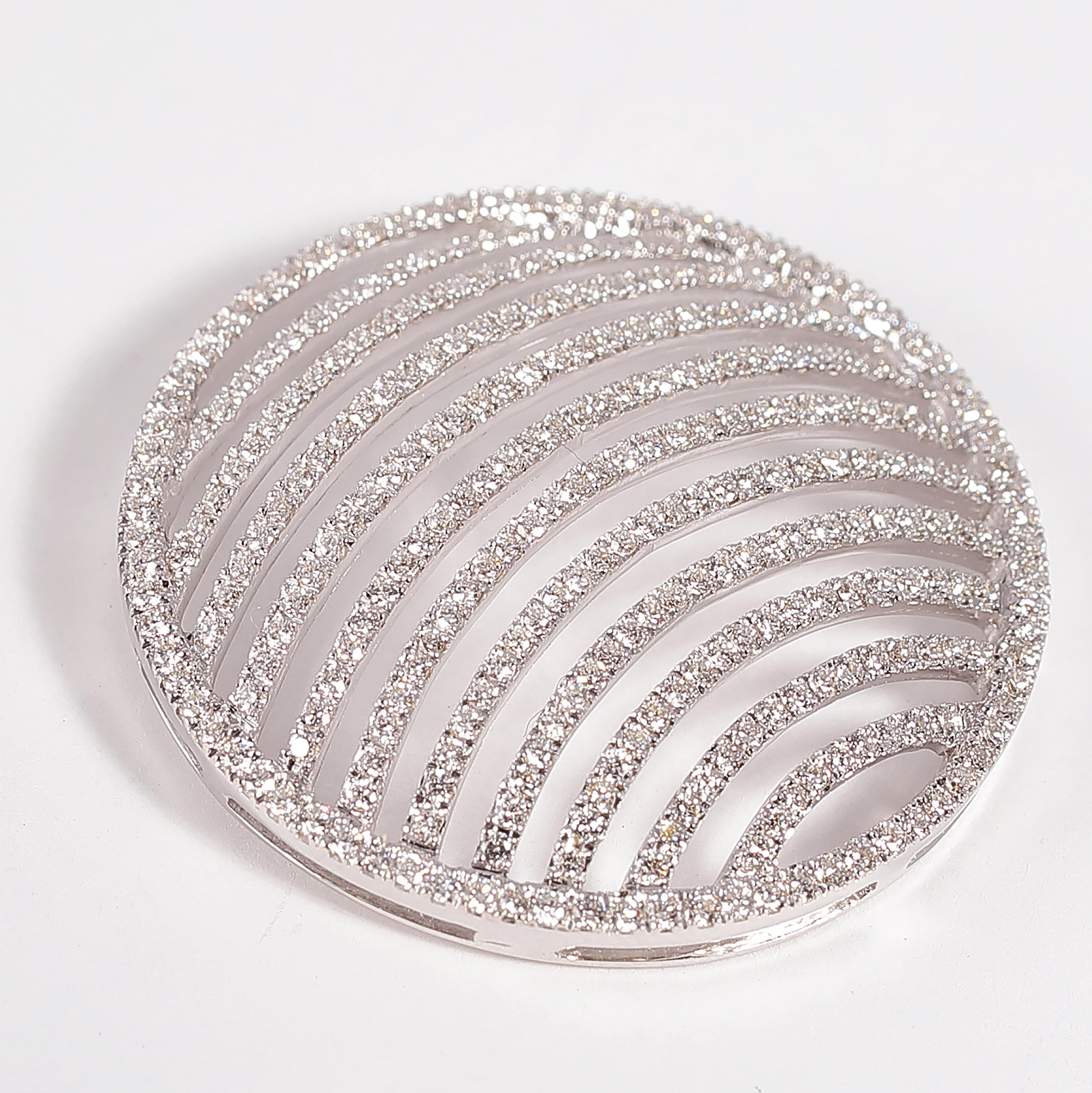 Such a versatile round pendant with eleven curved bars featuring 0.65 cts of diamonds, all in 18 karat white gold. 